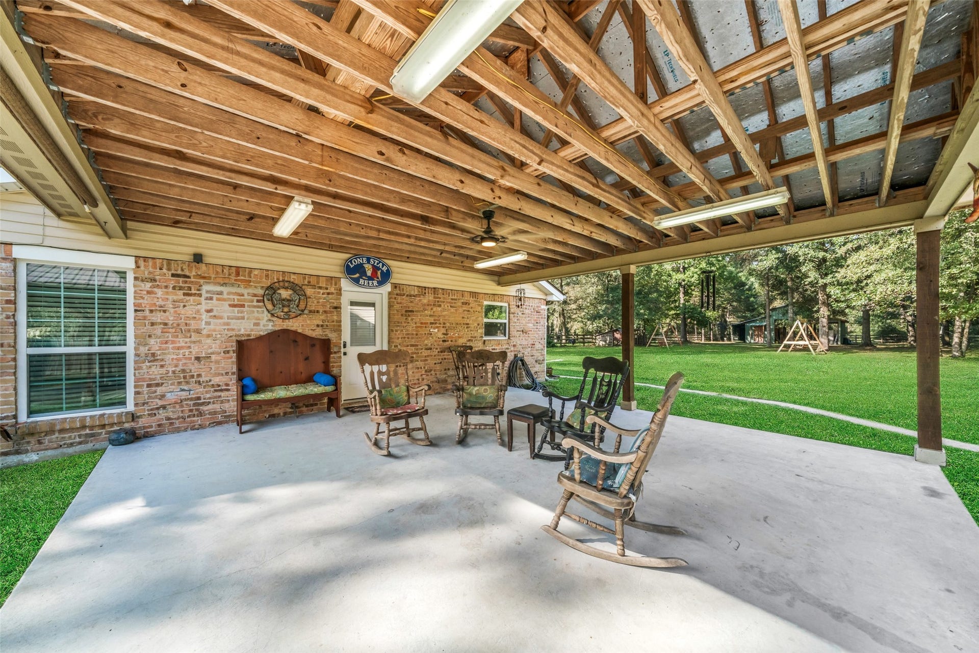 Enjoy the wide-open spaces surrounding this expansive well-lit and breezy covered patio, where relaxing, entertaining, and making memories come naturally. Step through the door, and that same sense of openness continues inside, where an inviting open-concept floor plan seamlessly connects the living and dining areas with a huge island kitchen