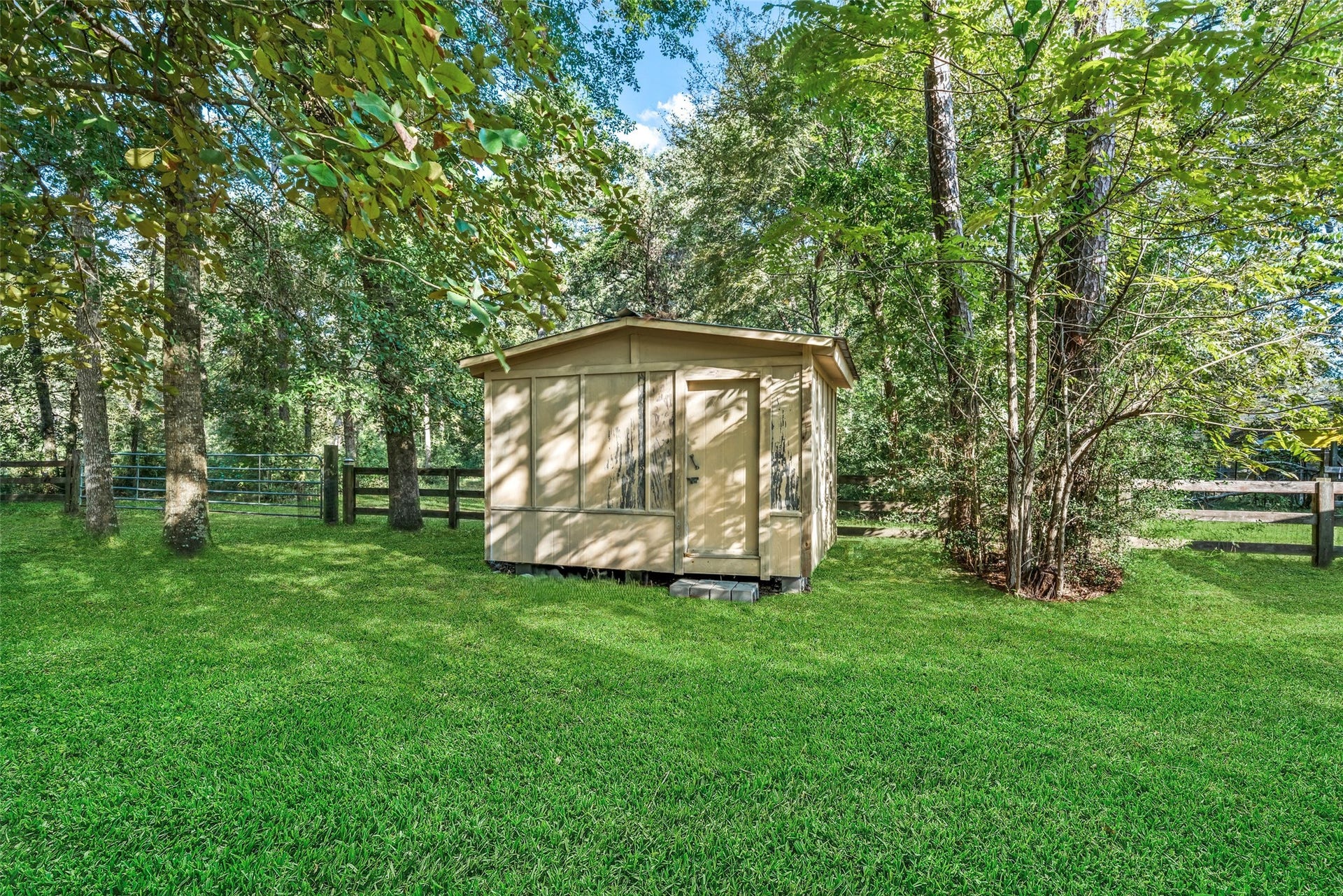 Small storage shed, perfect size for all of your gardening tools.  There is plenty of room if you love gardening, this would be a great place to keep everything you need handy.
