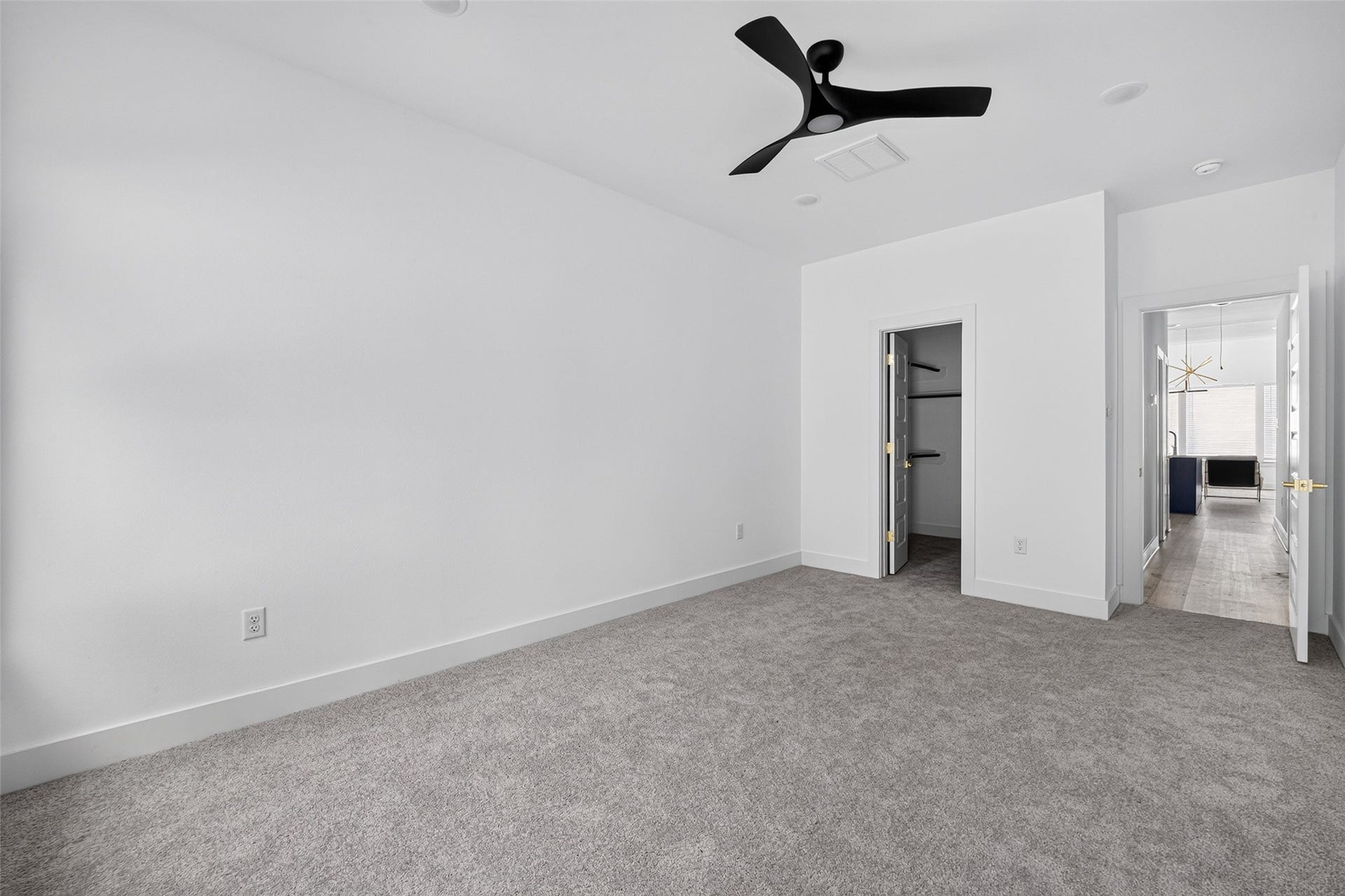 9309 Caddo Road, #A/B, Houston, TX 77078 Thoughtfully designed for restful nights, complete with sleek black fixtures, plush carpet, and effortless flow to the living areas and bath.