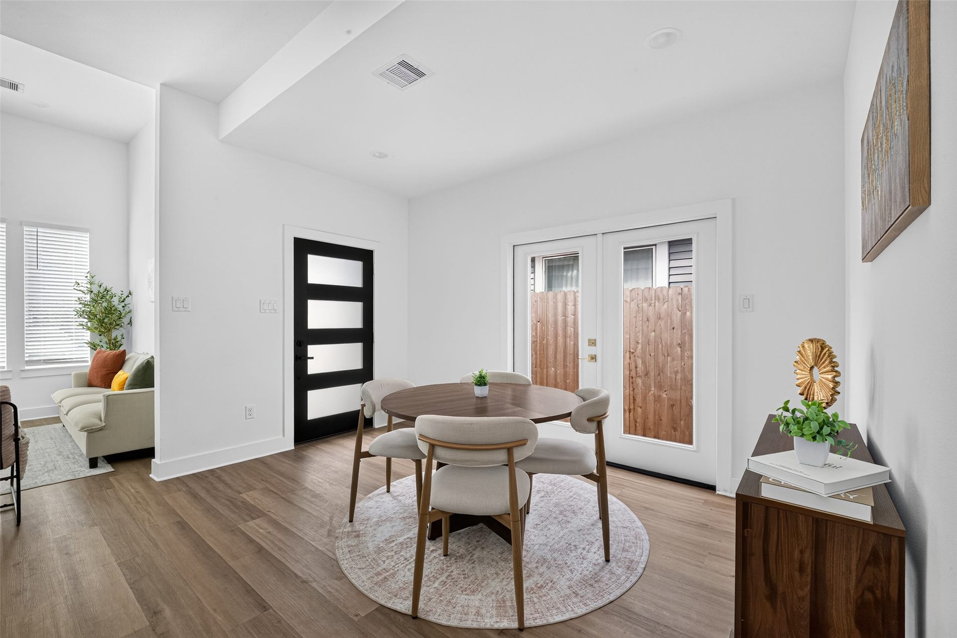 9309 Caddo Road, #A/B, Houston, TX 77078 Bathed in natural light, this charming dining space is tailor-made for everyday meals and intimate dinner parties alike