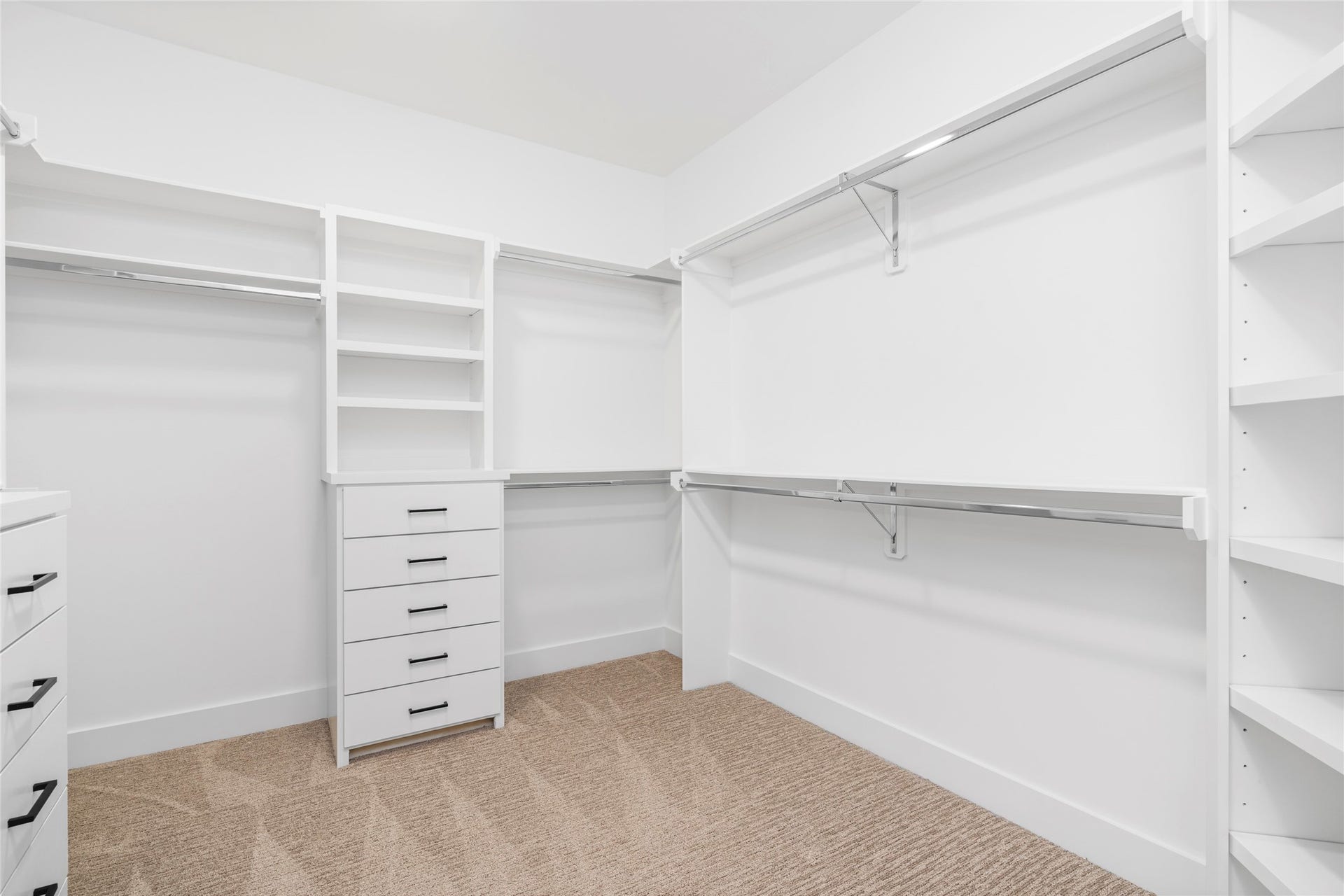 2410 Elmen Street, Houston, TX 77019 Per builder, professionally designed closet with built-ins, adjustable and metal rods.