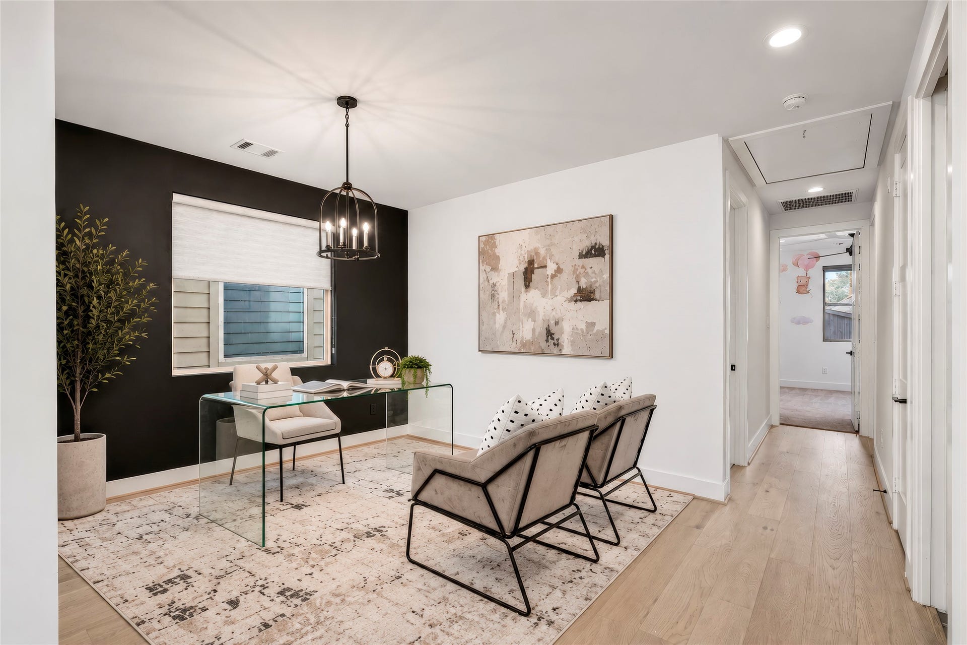 2410 Elmen Street, Houston, TX 77019 Home Office/Study or flex space for whatever you need it to be that fits your lifestyle. Accent wall and custom shade on the window. Designer lighting. Engineered wood flooring. Virtually rendered.
