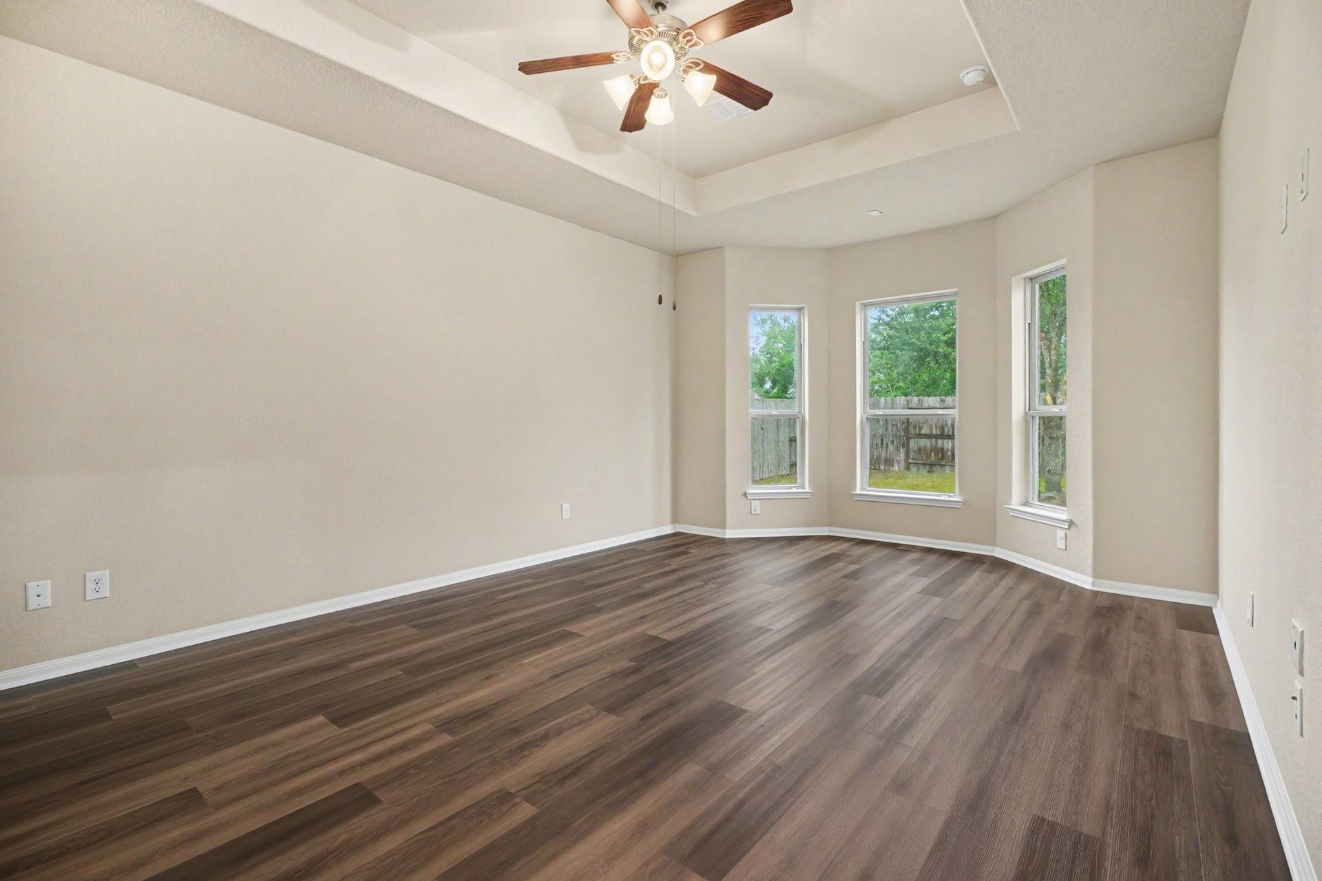 Welcome to the serene primary retreat with gorgeous LVP flooring, vaulted ceiling and bay windows!