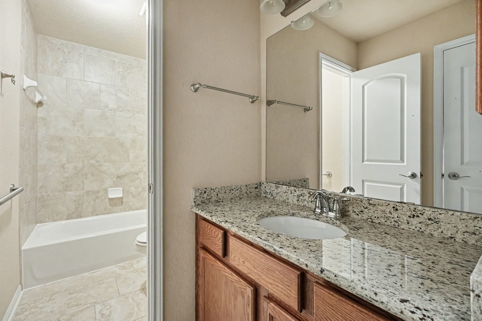 A secondary bathroom with separate wet space for added privacy!