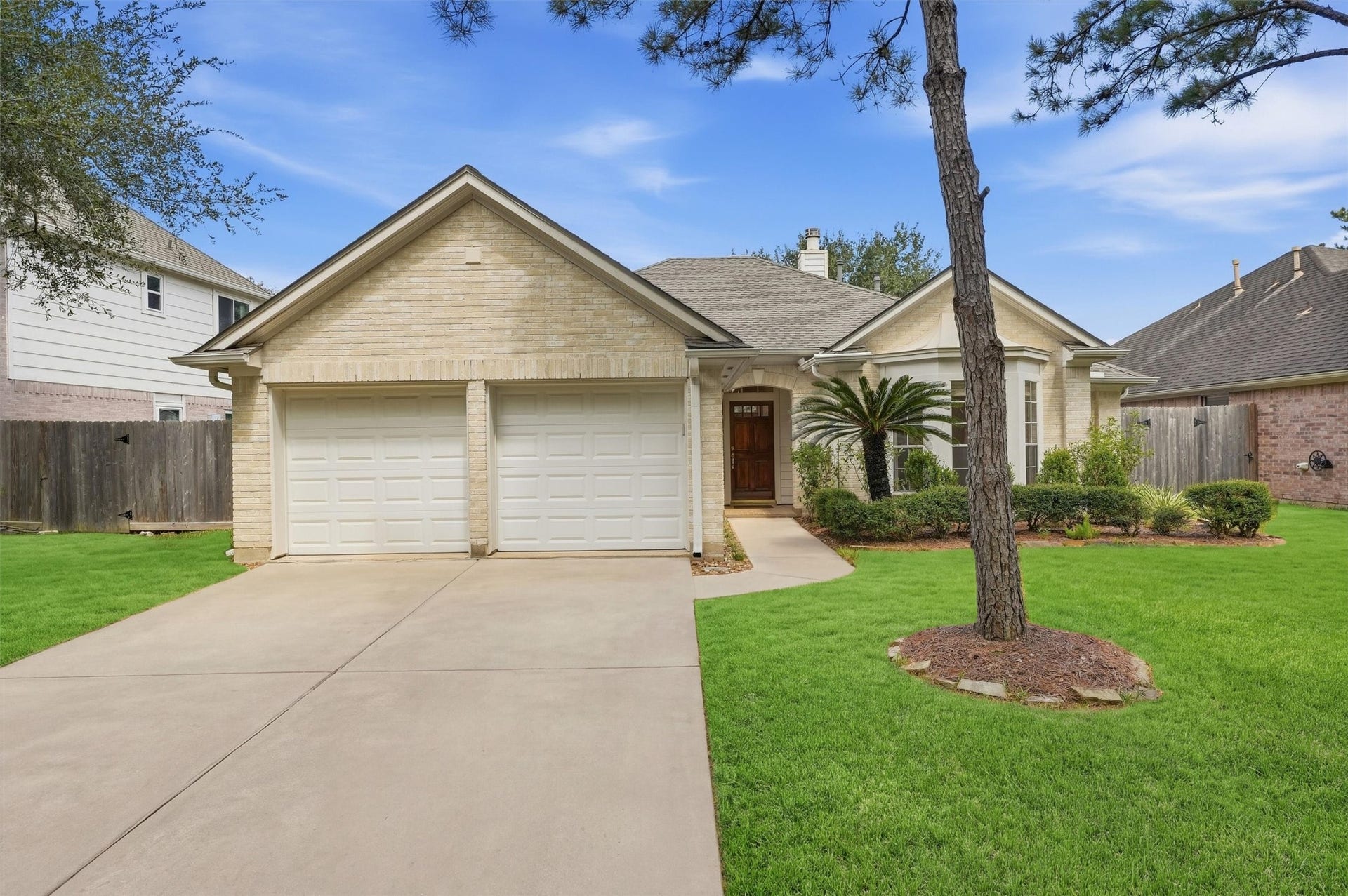 13827 Placid Brook Court, Houston, TX 77059 Charming single-story home with a bay window and gorgeous solid wood door.