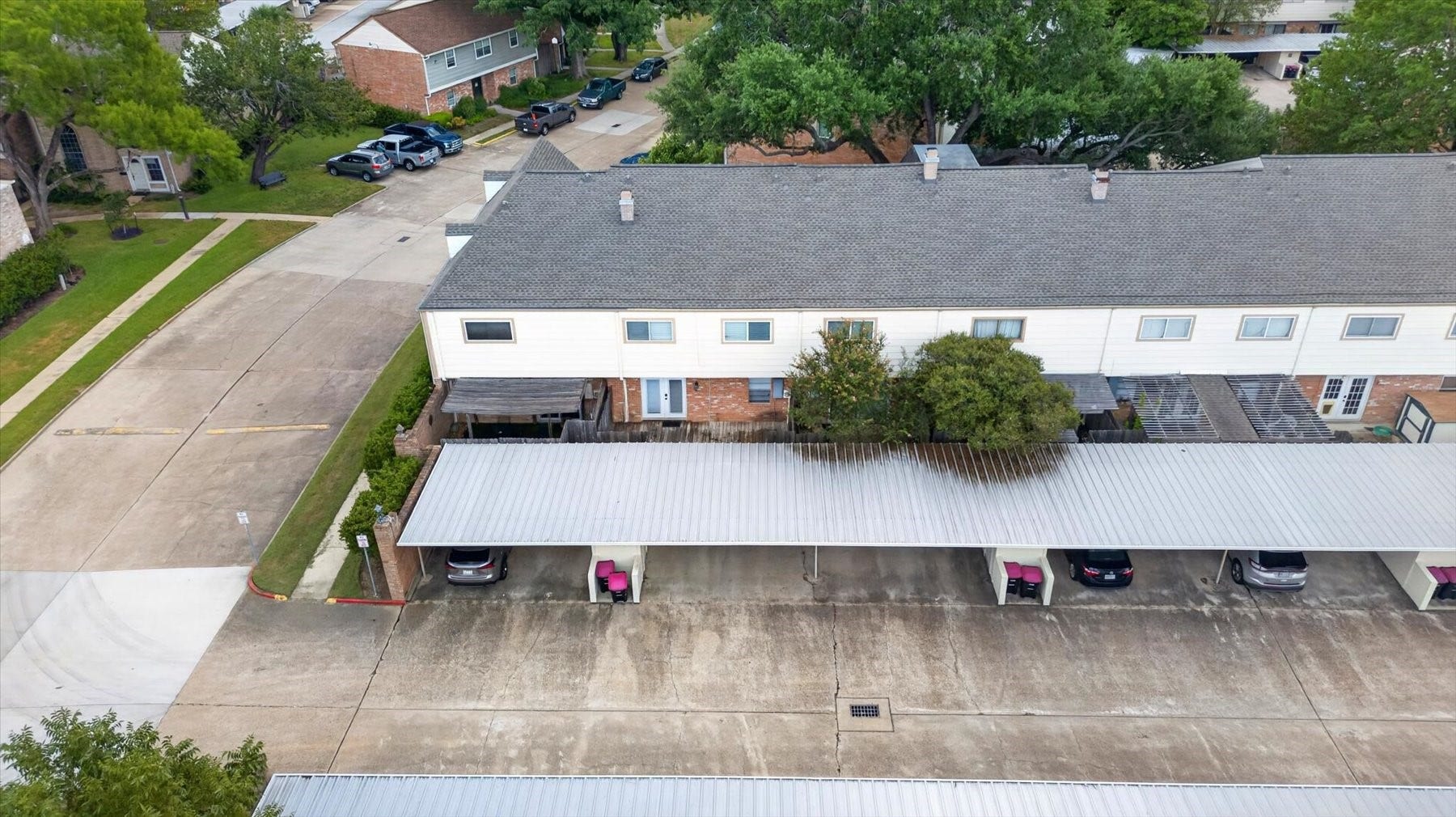 Carport area has an additional storage area outside.