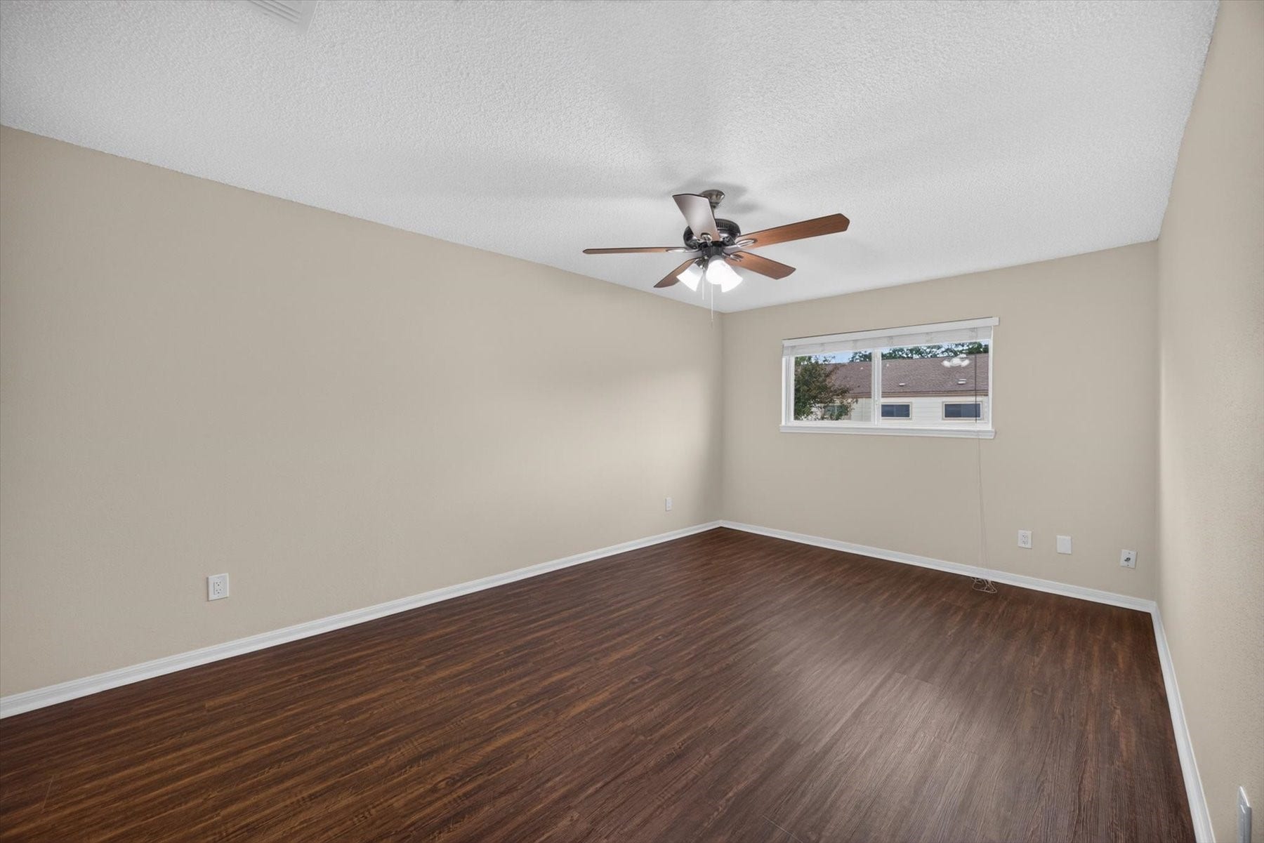 Another view of the primary bedroom. Ample wall space for all your large furniture pieces.