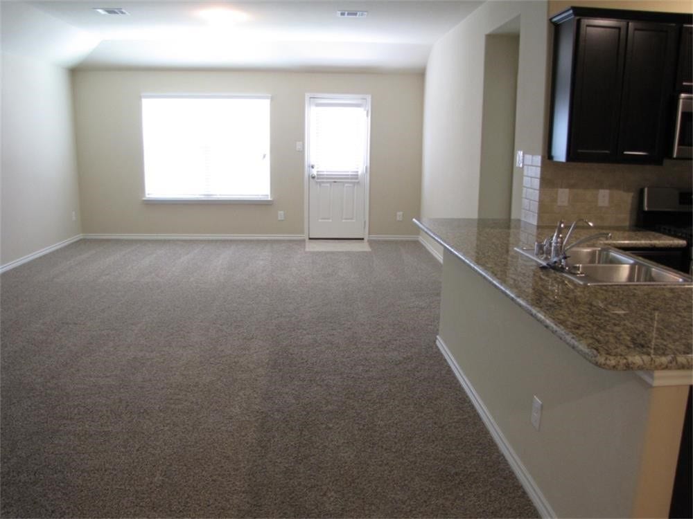 1911 Seville Manor, Fresno, TX 77545 Den