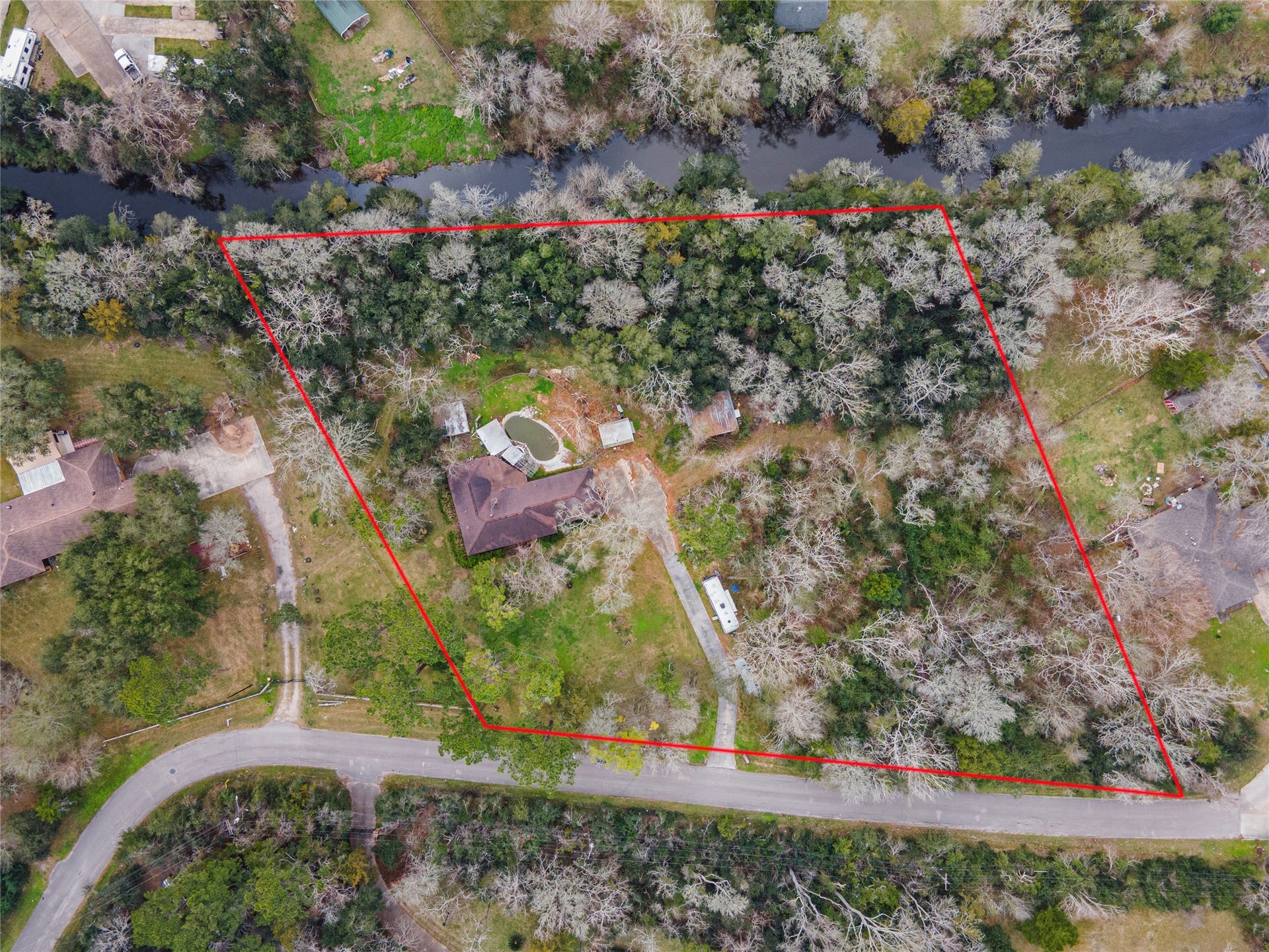 9103 Lazy Lane, Hitchcock, TX 77563 Just under 3 acre lot on the bayou