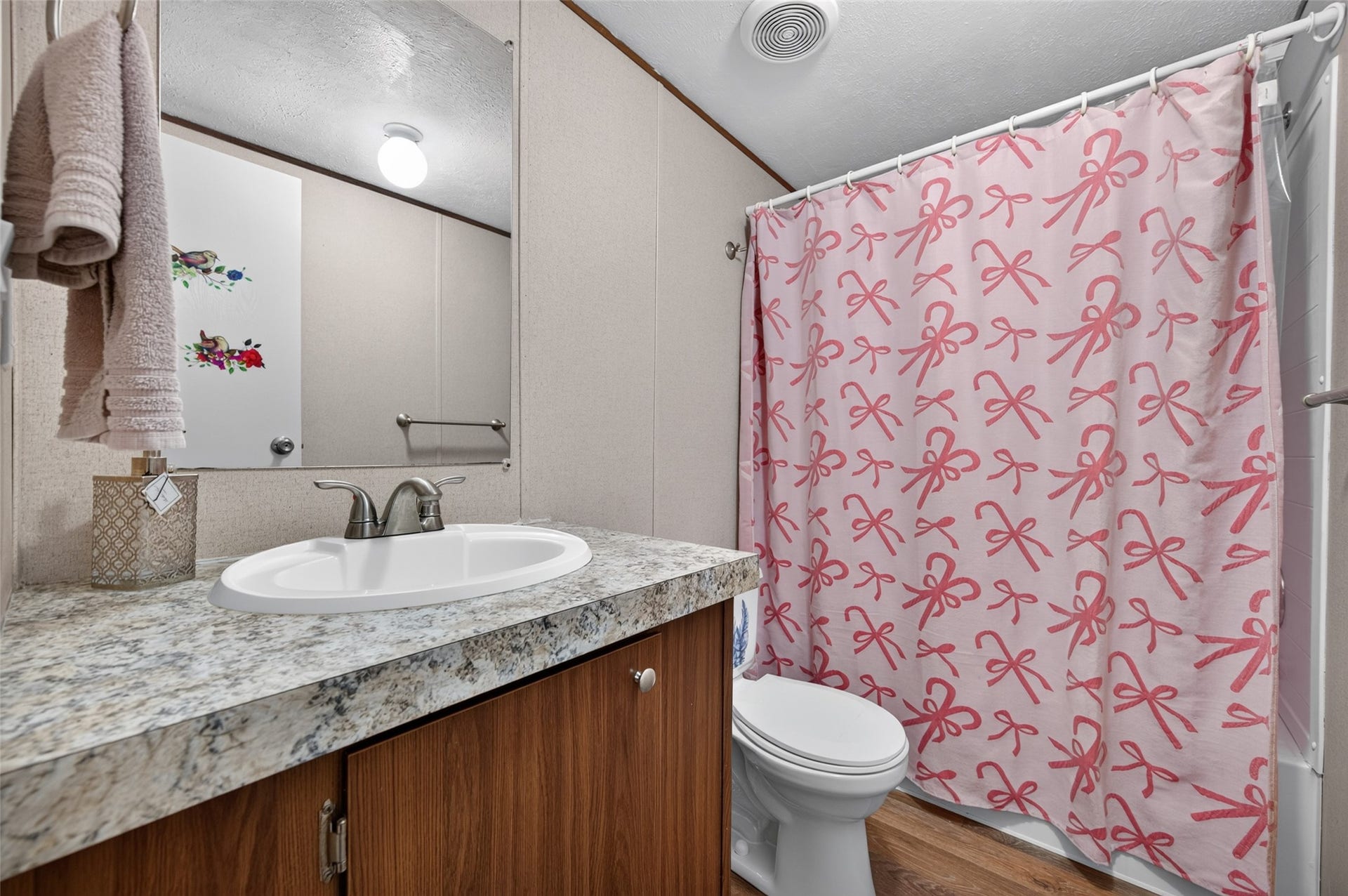 Second full bathroom, conveniently located near the bedrooms