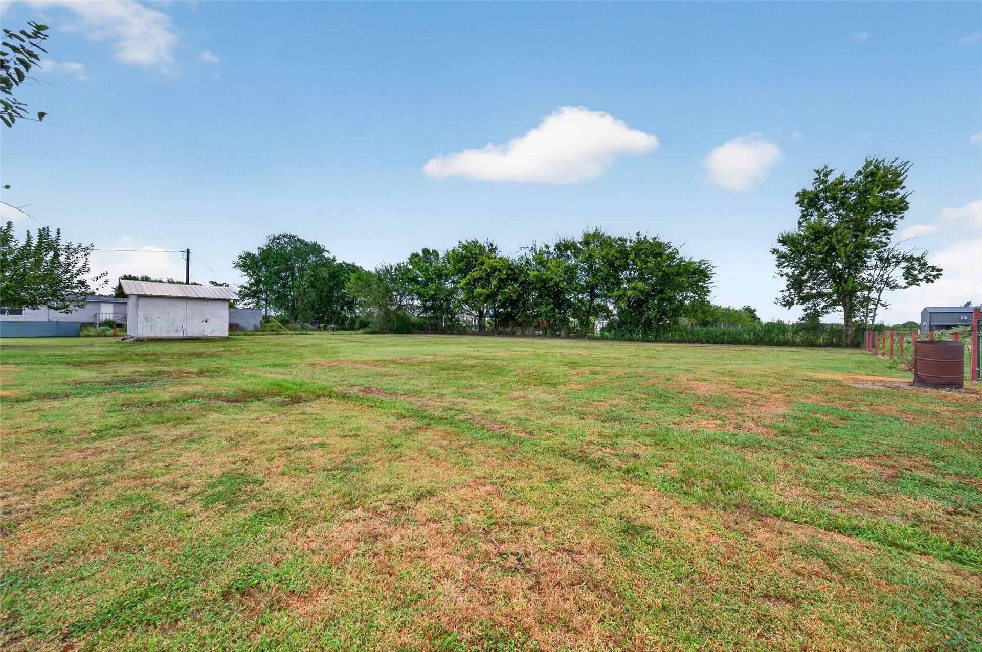 Expansive backyard with plenty of room to roam and enjoy the outdoors
