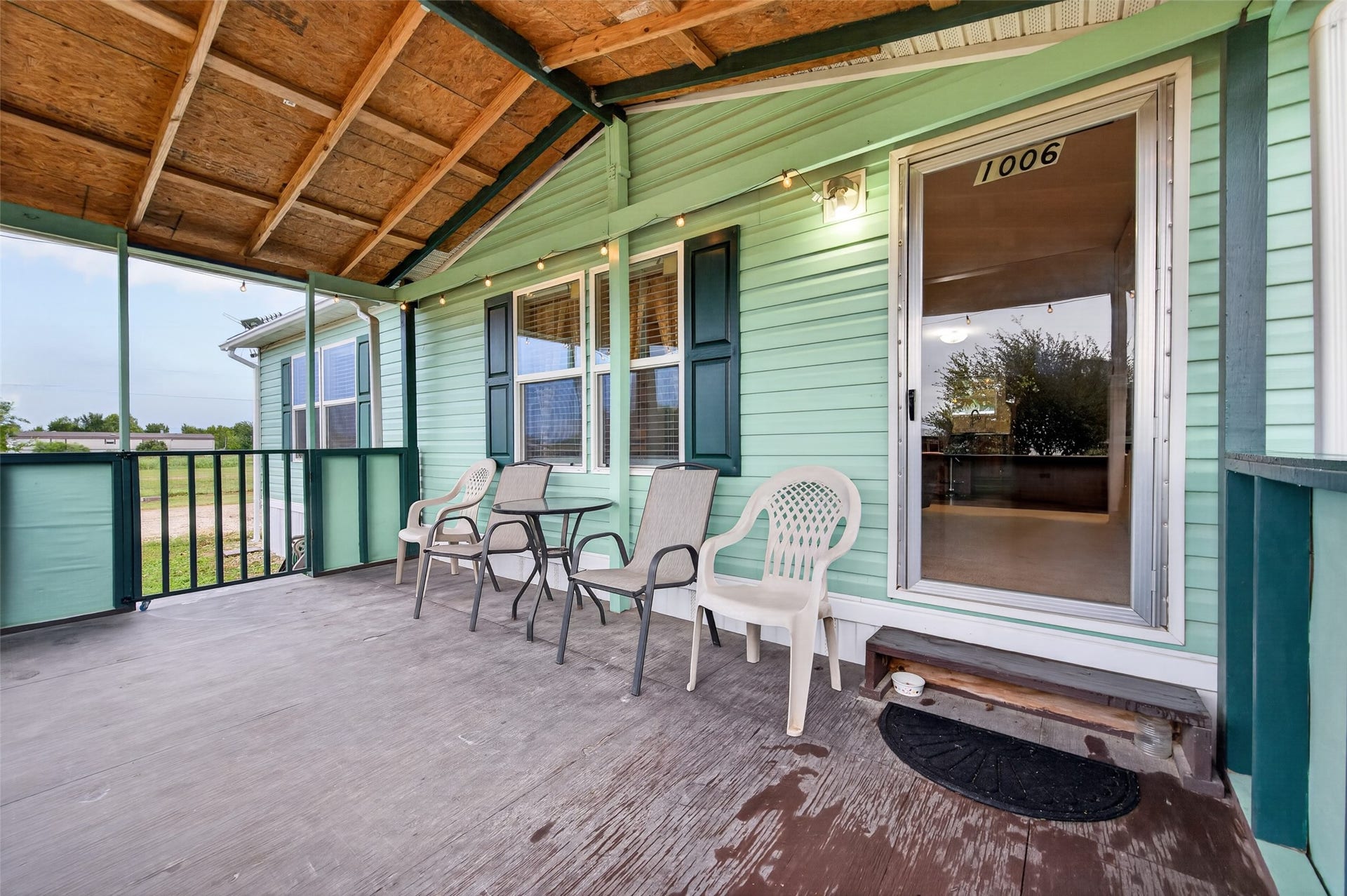 Welcoming covered front porch, the perfect spot for morning coffee