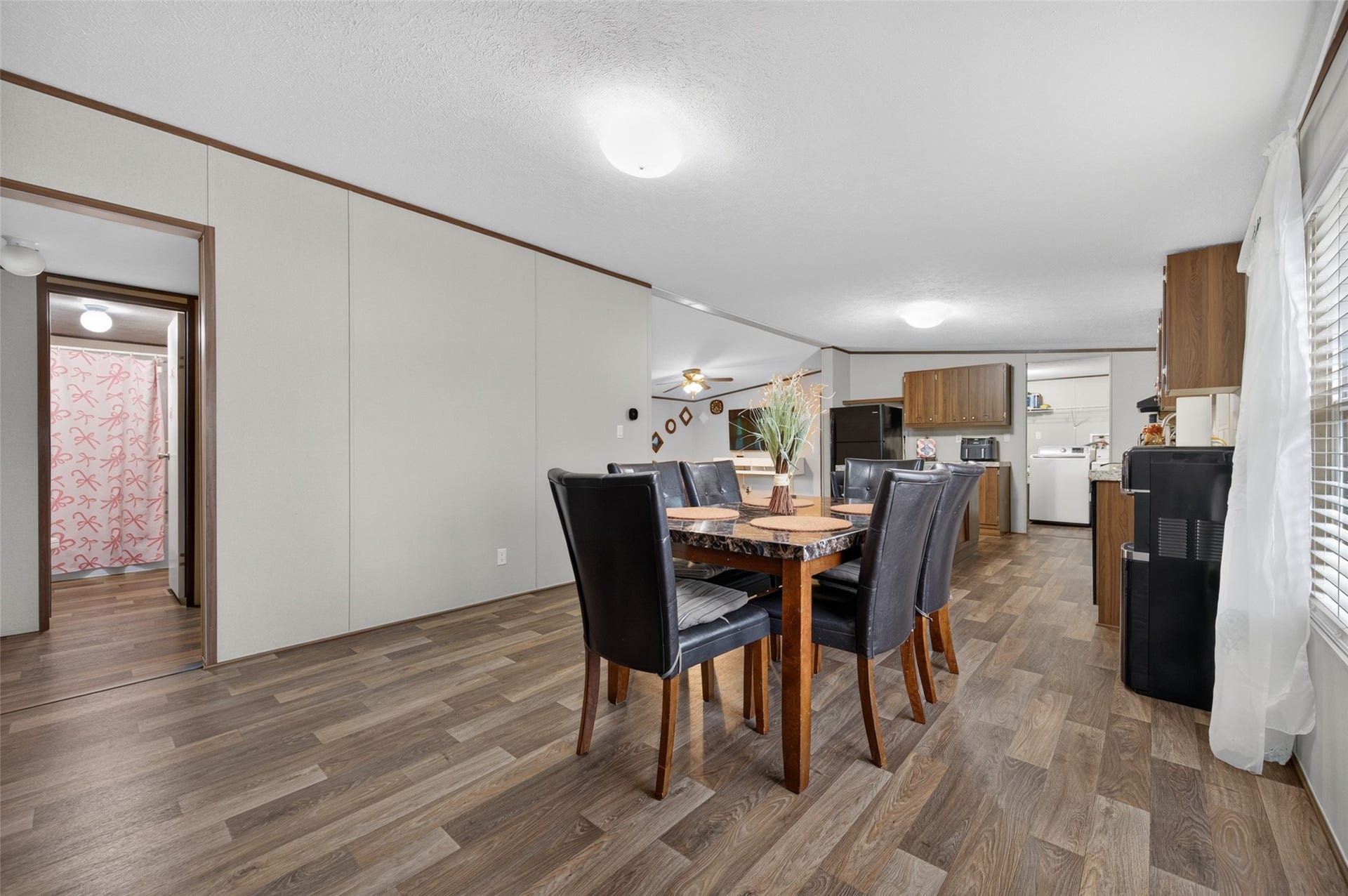 Dining space with easy access to the bedroom hallway
