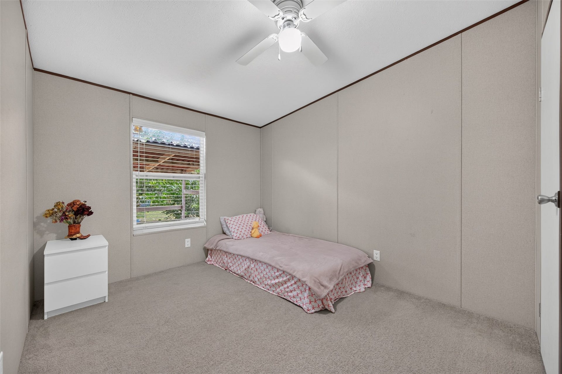 Additional bedroom offering flexible space for guests or a home office