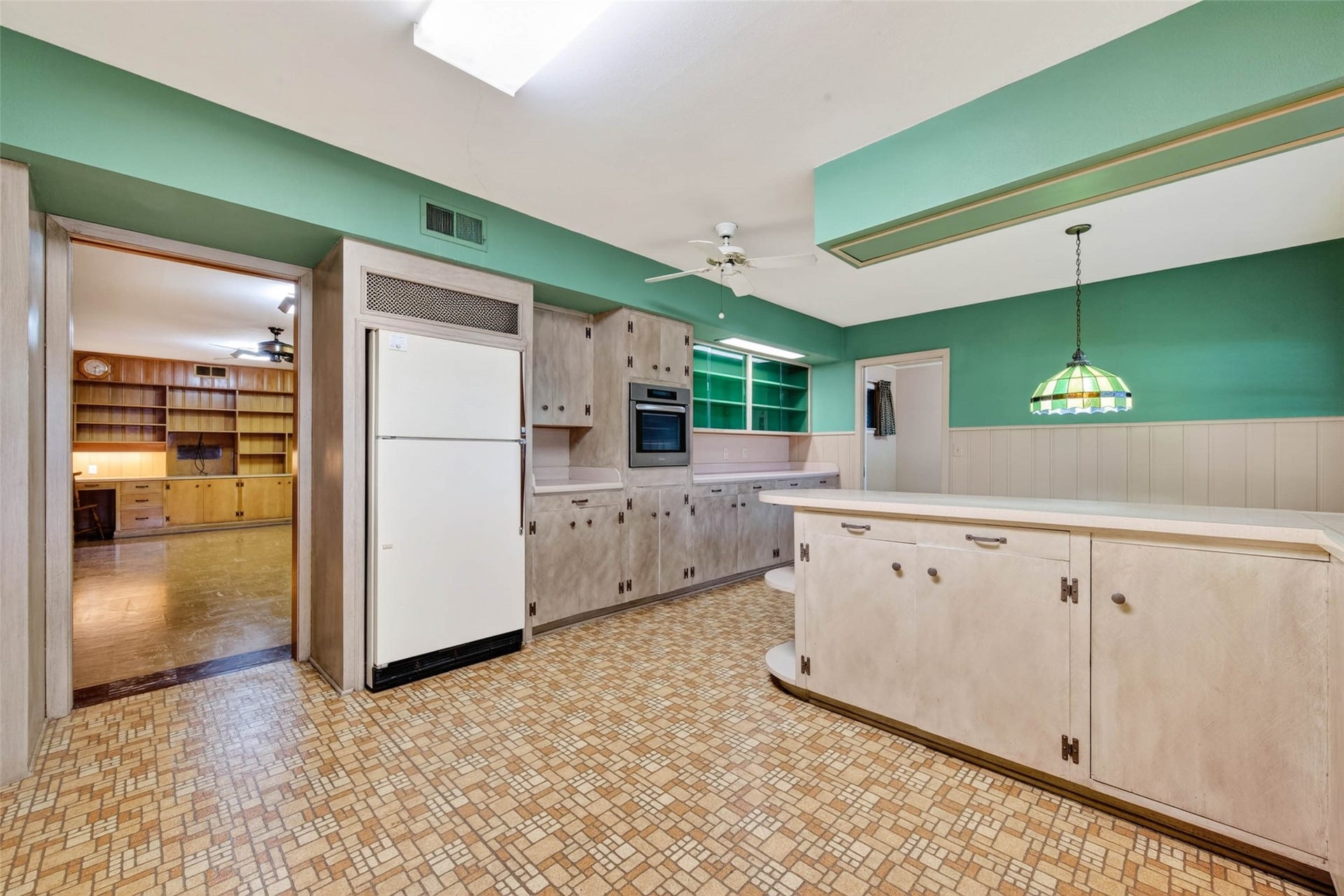 Kitchen view with entry to the den