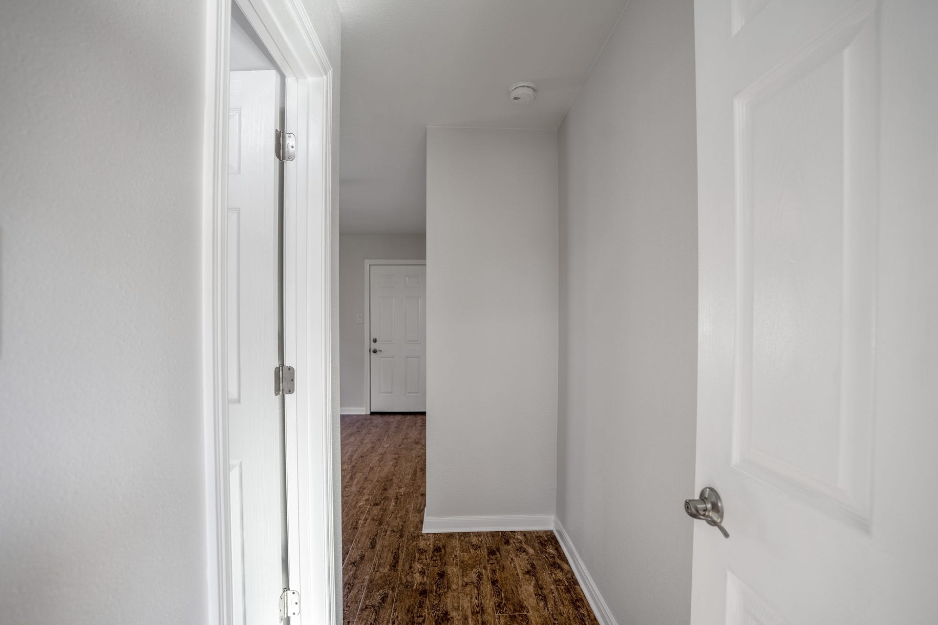 306 Foster Street, Tomball, TX 77375 Back in the hallway, well continue toward the primary suite at the end of the hall. The open doorway on the left leads into the primary bathroom.