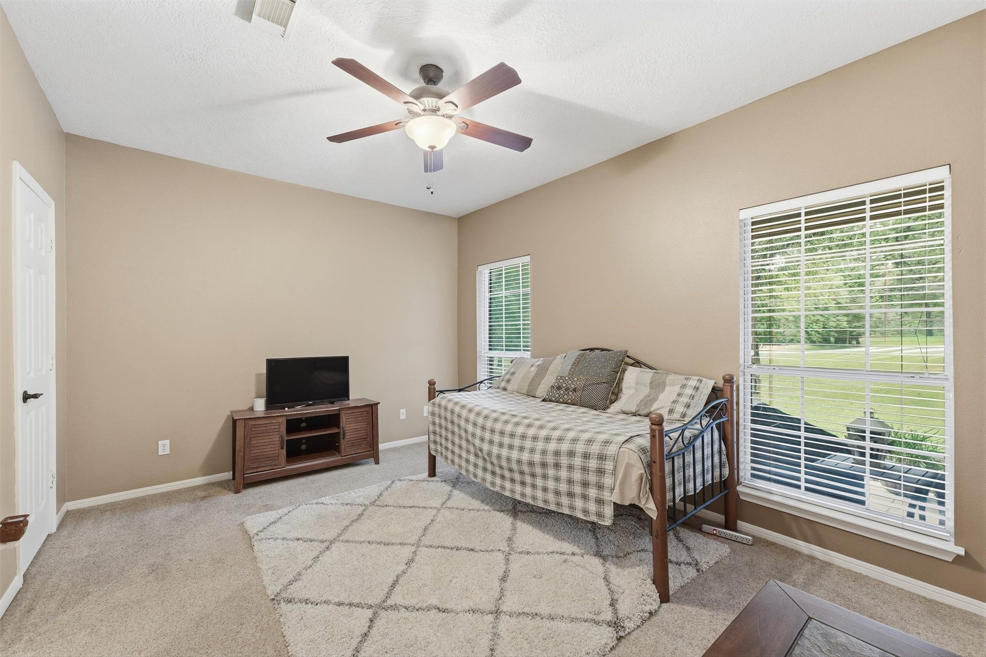 Another spacious bedroom.