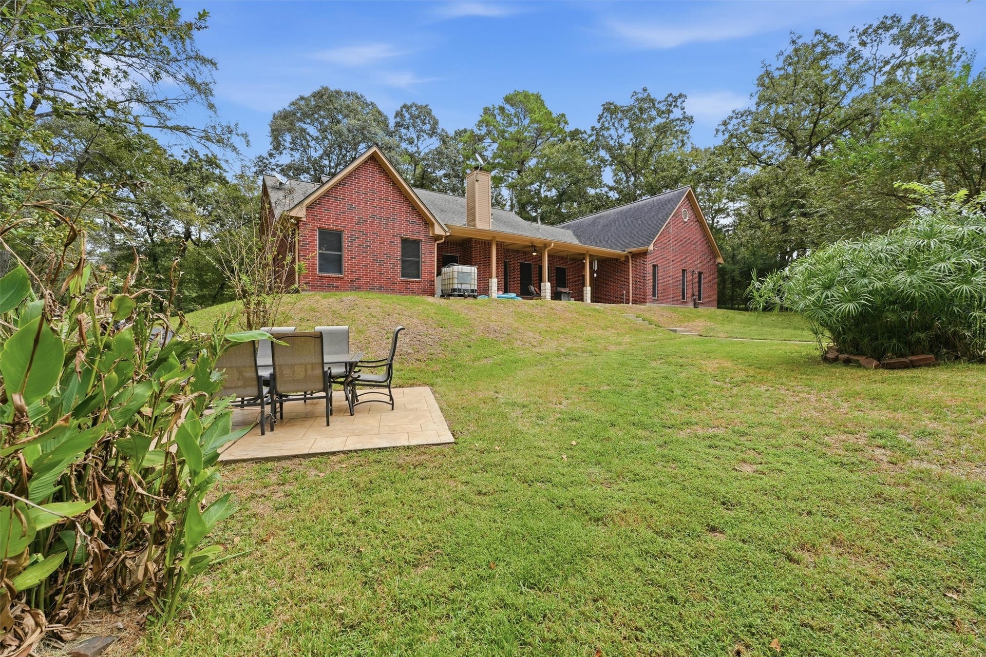 This view shows the expansive backyard.