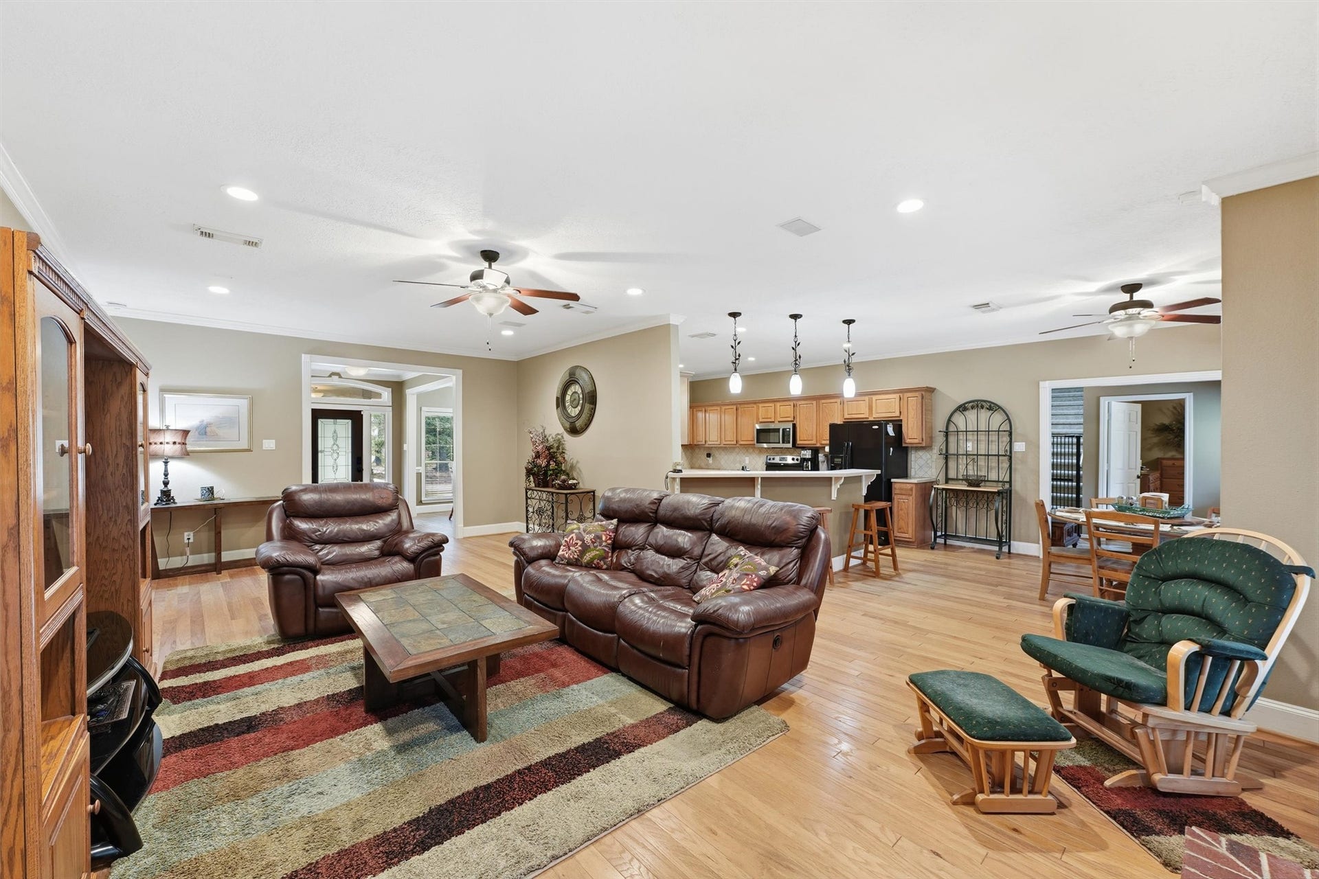Another view of living room highlights generous space and offers plenty of room for comfortable seating and plenty of room for family and friends.