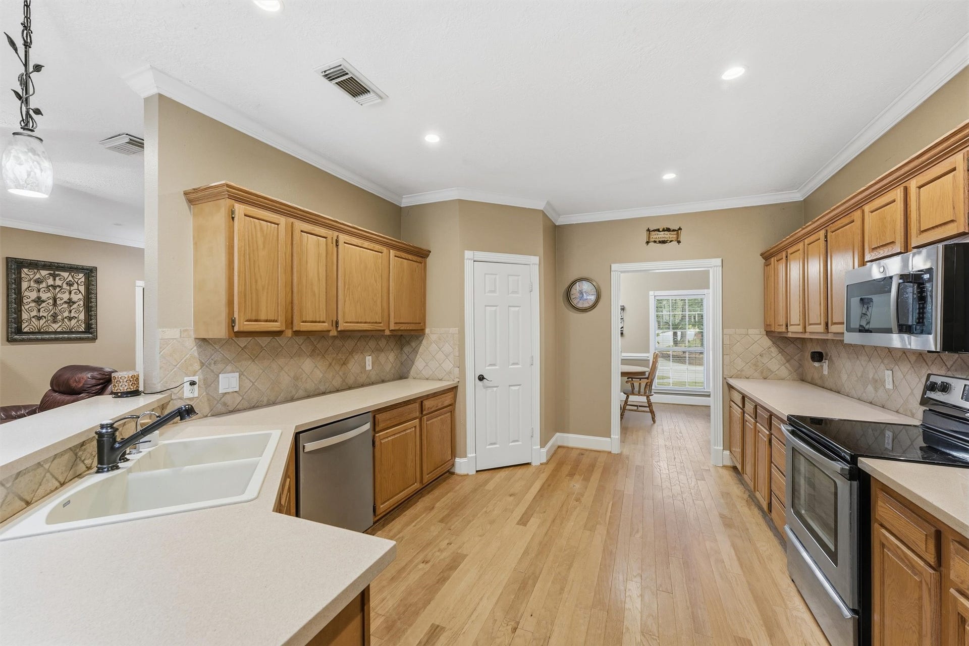 The kitchen creates a welcoming and functional space for everyday cooking and entertaining.