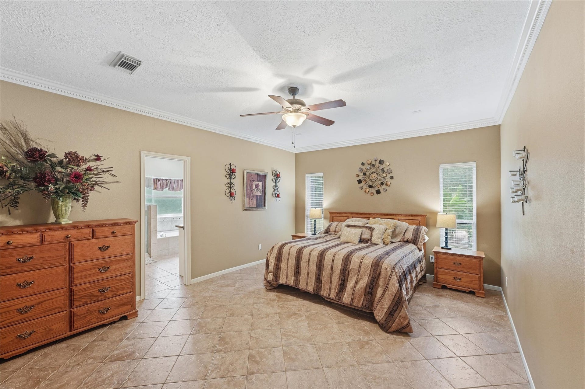 Impressive size primary bedroom. Plenty of room for king size bed and additional furnishings.