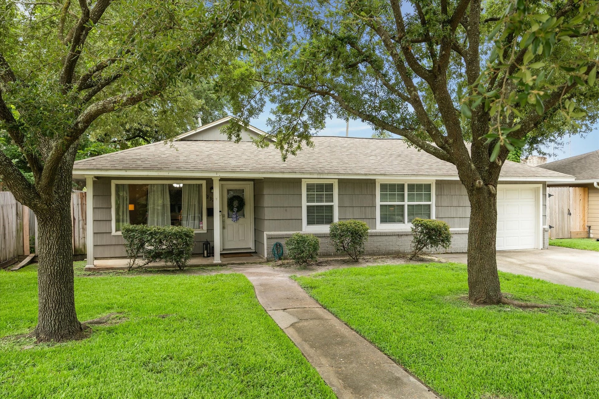 Welcome to 2327 Saxon. Charming curb appeal with mature trees and a wide front porch create a warm, welcoming first impression. BONUS!! Just STEPS from TC Jester park, pool and trails!