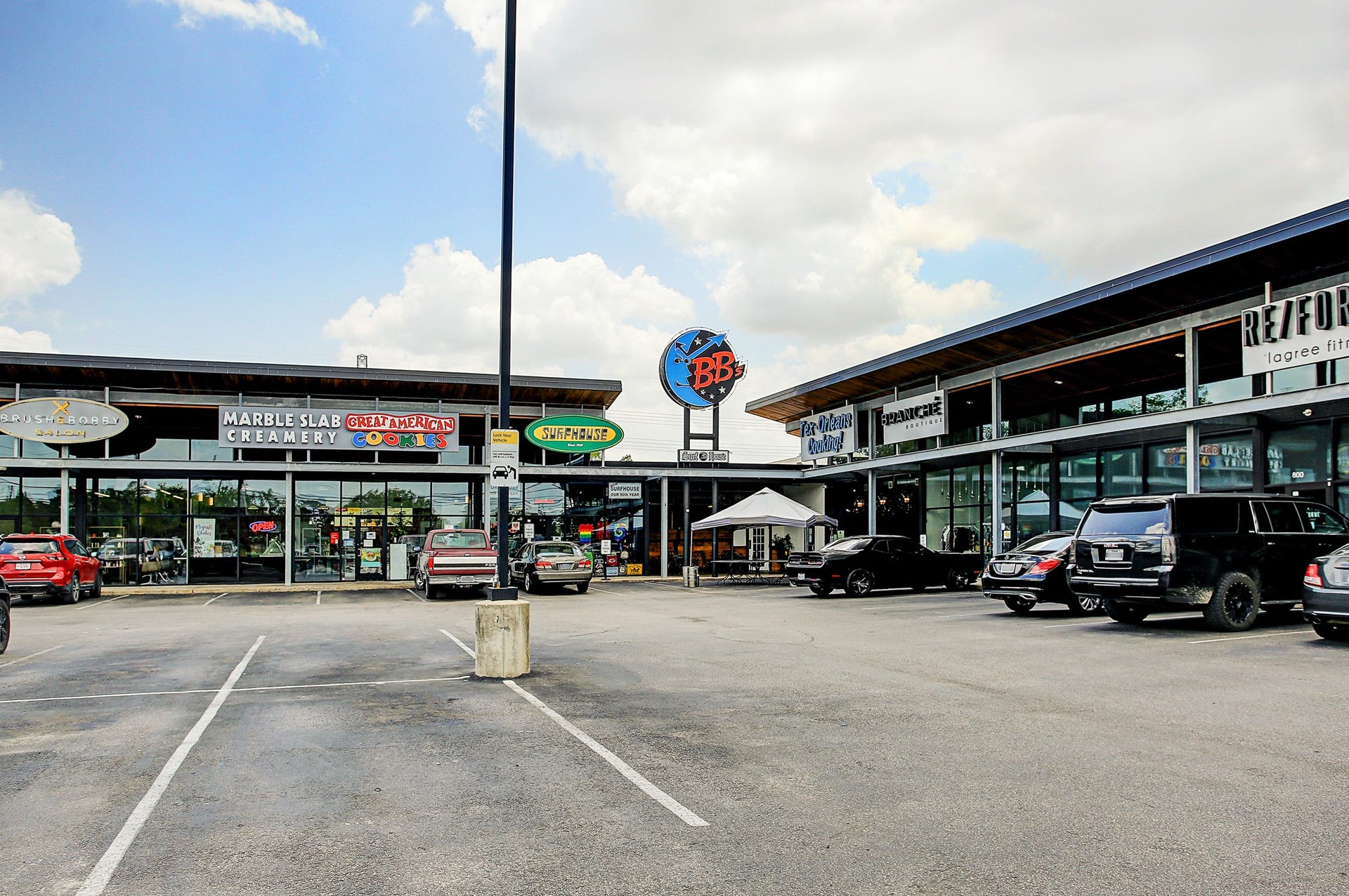The southwest corner of Ella and 34th has an array of restaurants, shopping areas.