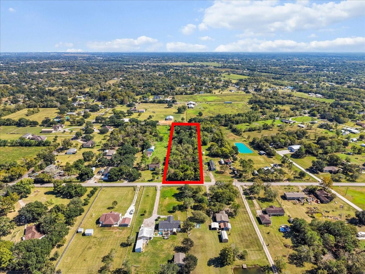 5029 1/2 Ike Franks Road, Santa Fe, TX 77517 While this property does need to be cleared, there are plenty of mature trees that can remain. That way, a future home can feel less like a new build and more like an established site.