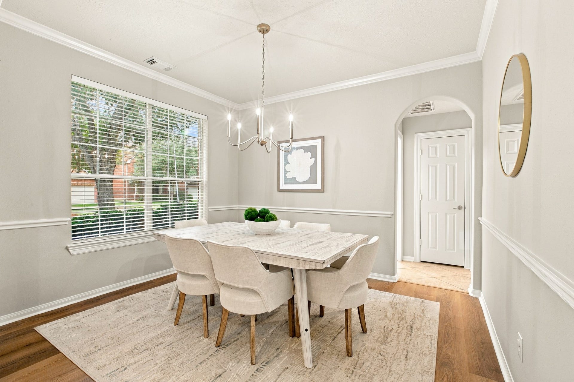 Formal dining room featuring an open, inviting layout and abundant natural light.