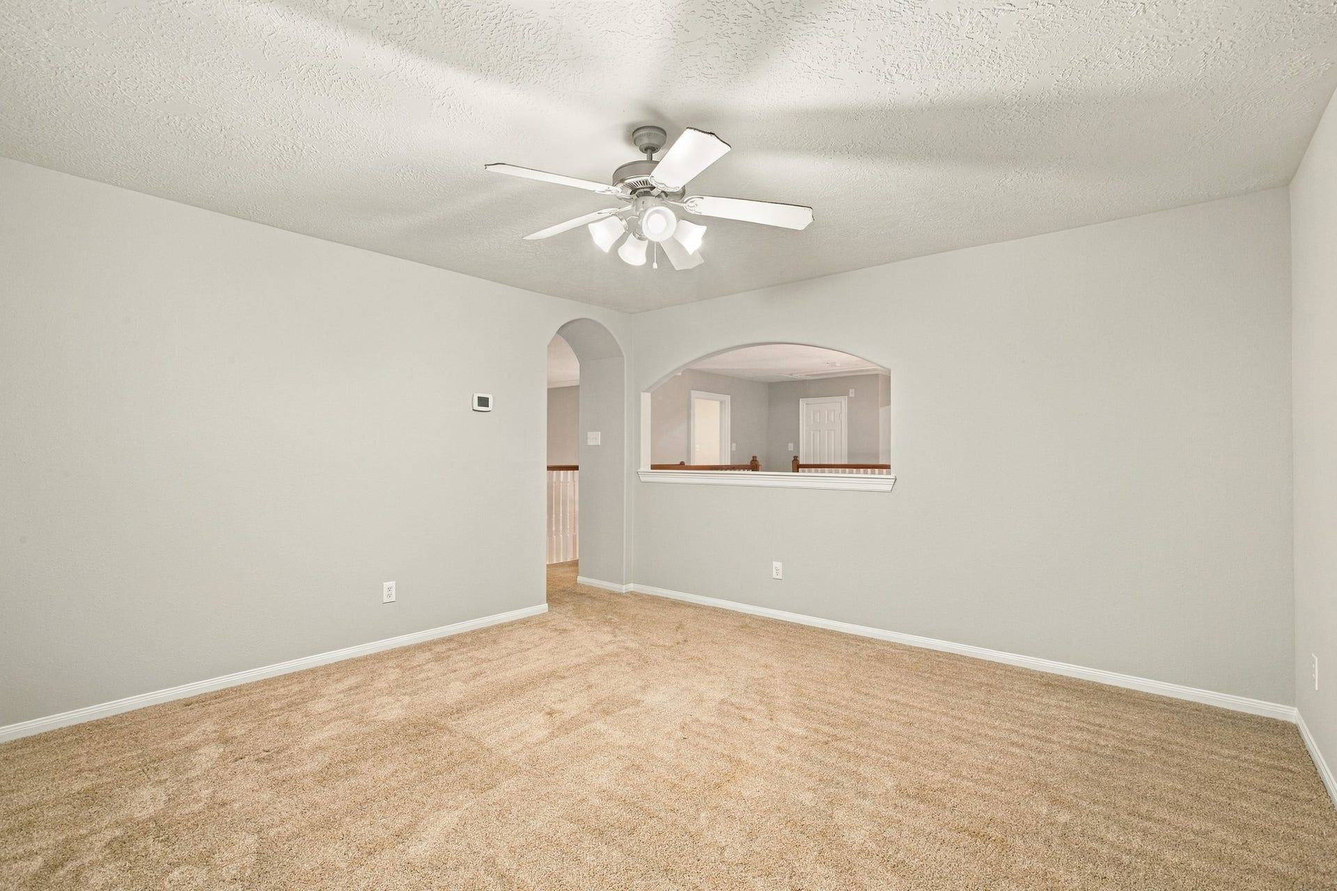 Spacious flex/game room located upstairs.