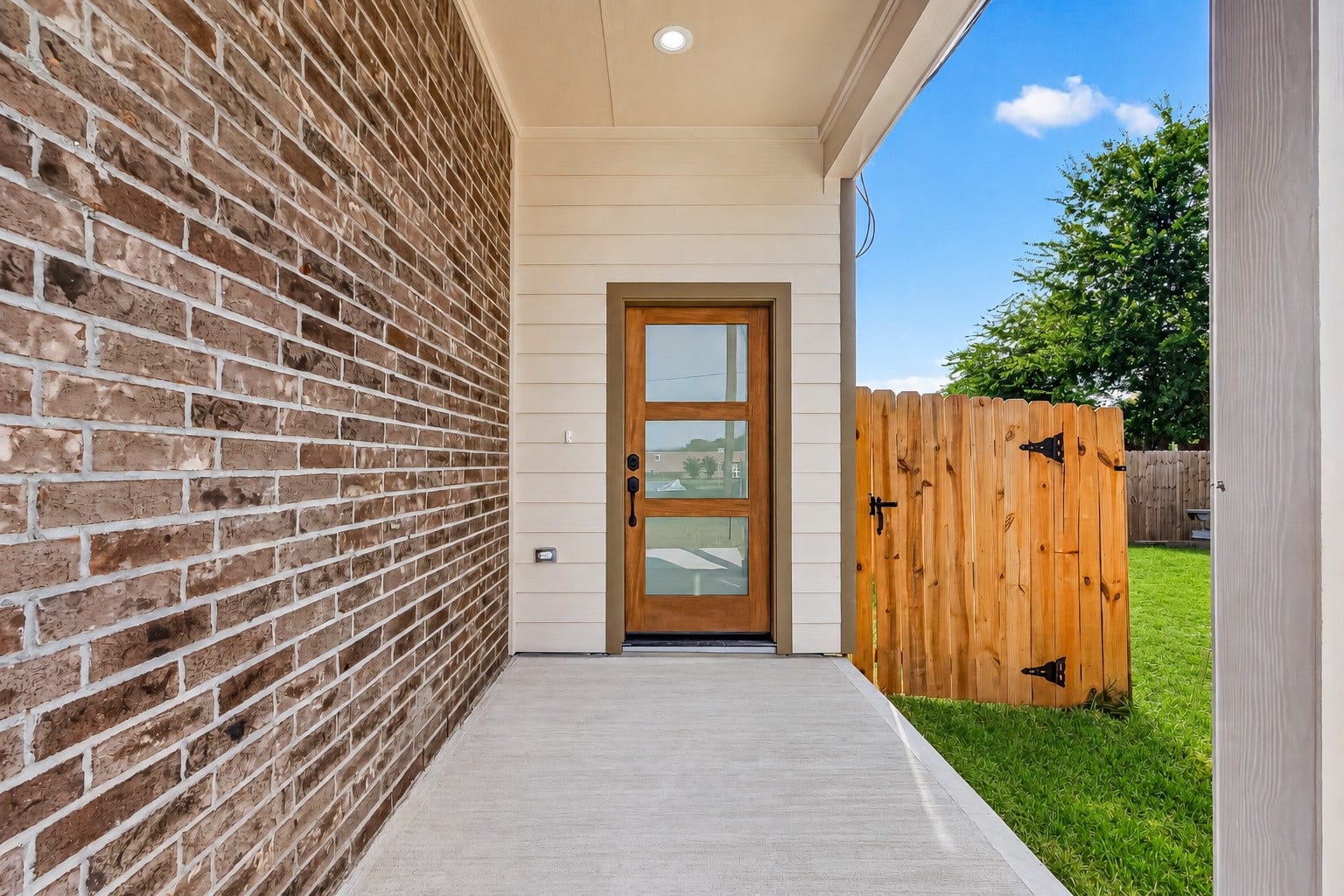 8110 Carver Road, Houston, TX 77088 Covered front entry creates a welcoming arrival and a defined entrance for each residence.