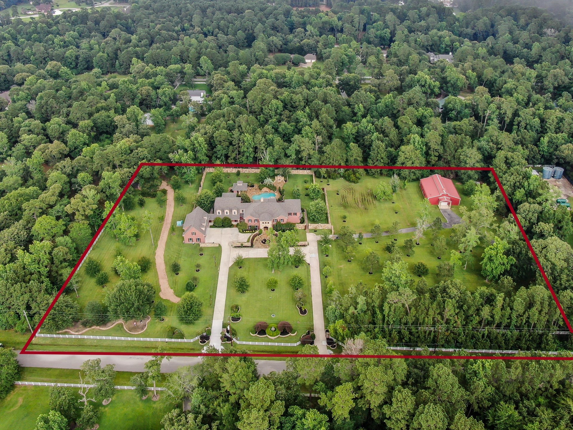 9310 Diamante Drive, Magnolia, TX 77354 Welcome to 9310 Diamante Dr - A fully remodeled 6-acre luxury estate in Sendera Lake Estates.