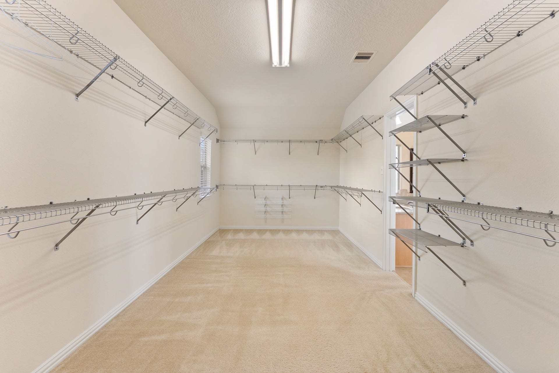 19415 Sorrell Ridge Drive, Spring, TX 77388 HUGE 9' x 20' closet off the primary suite.