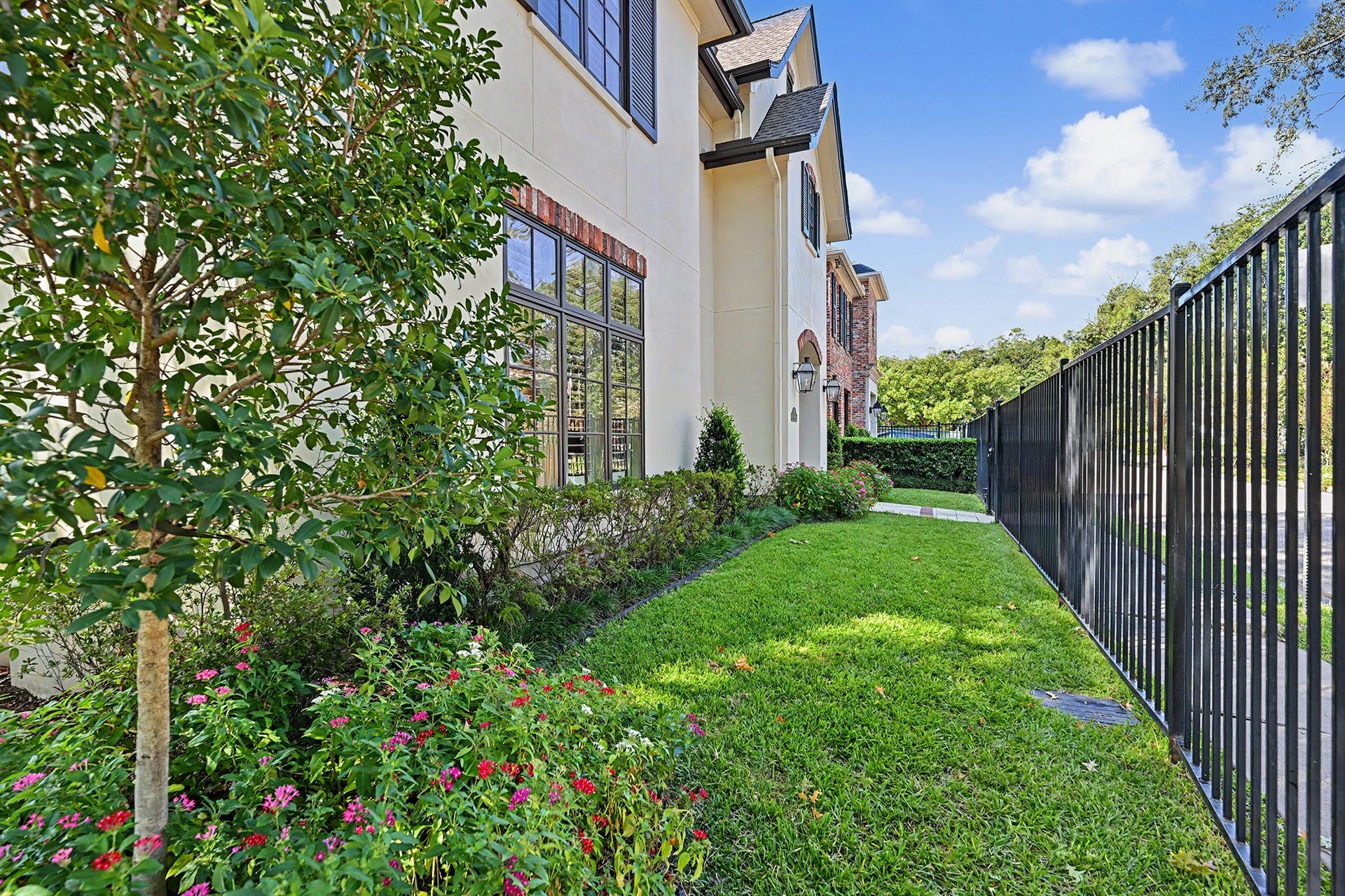 The fully fenced property offers additional outdoor space to enjoy in both the front and side yards.