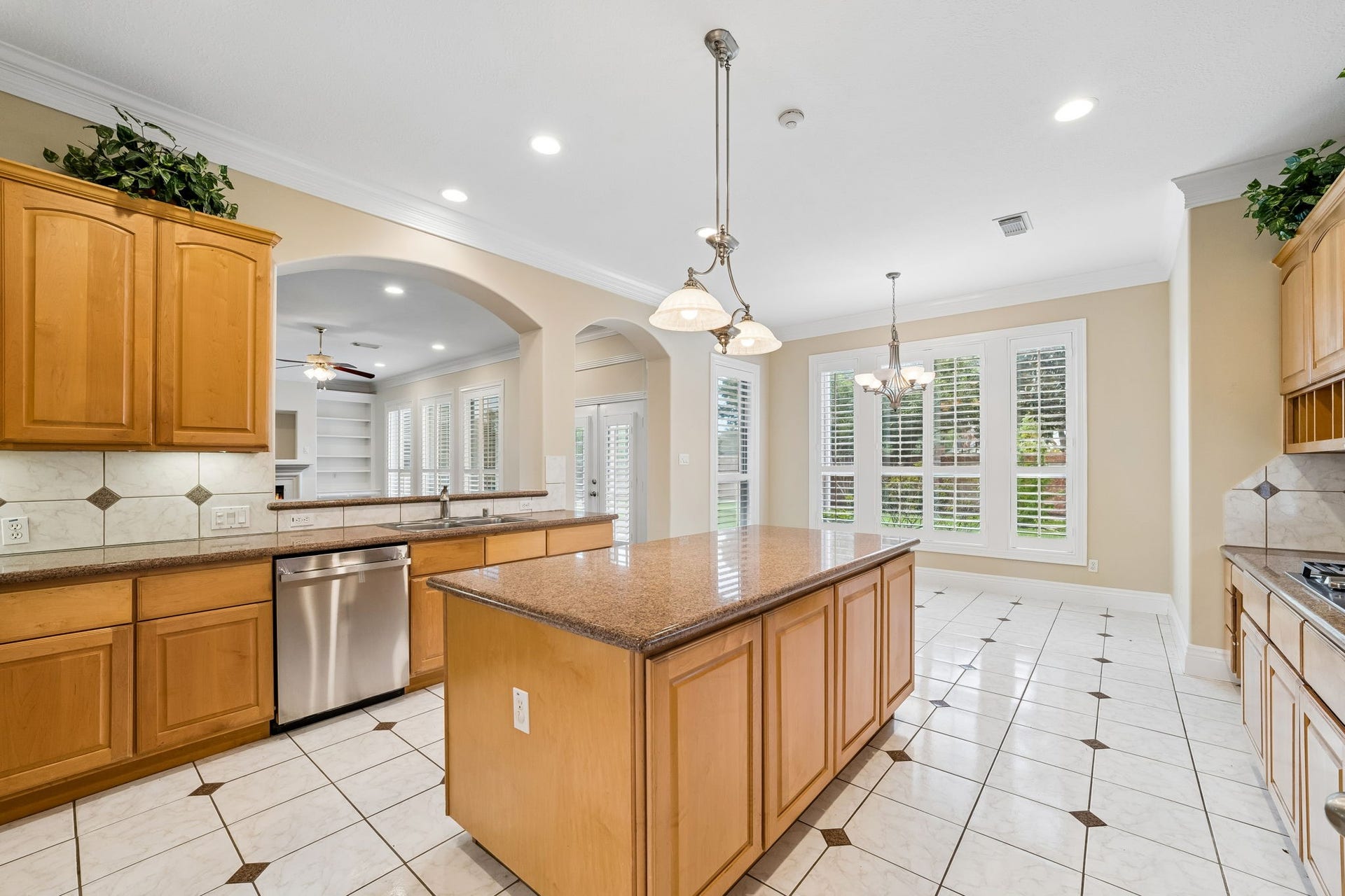 Oversized Kitchen with Granite  countertop.