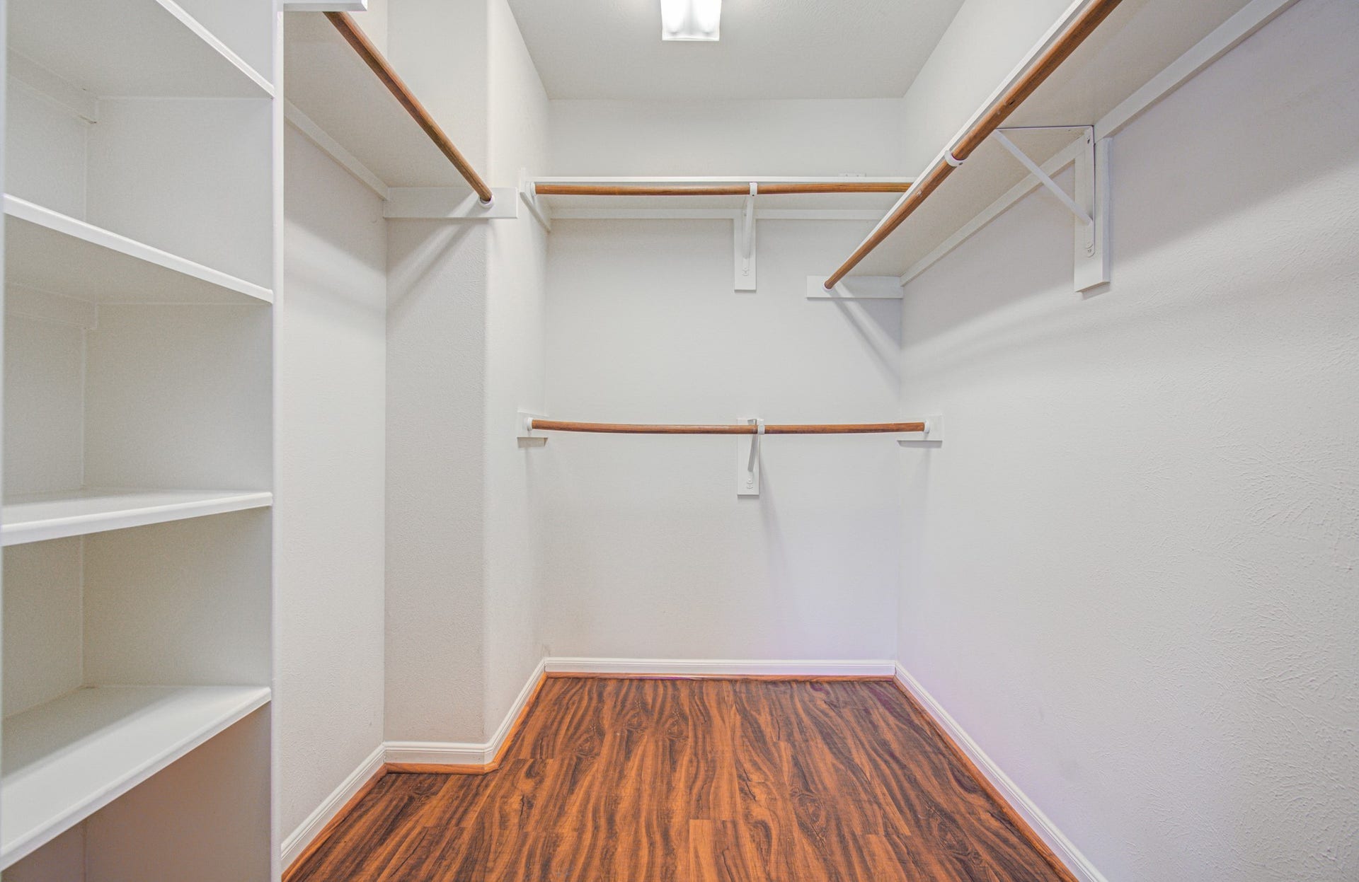 12808 Brook Arbor Court, Pearland, TX 77584 Primary walk-in closet with ample shelving and hanging space.