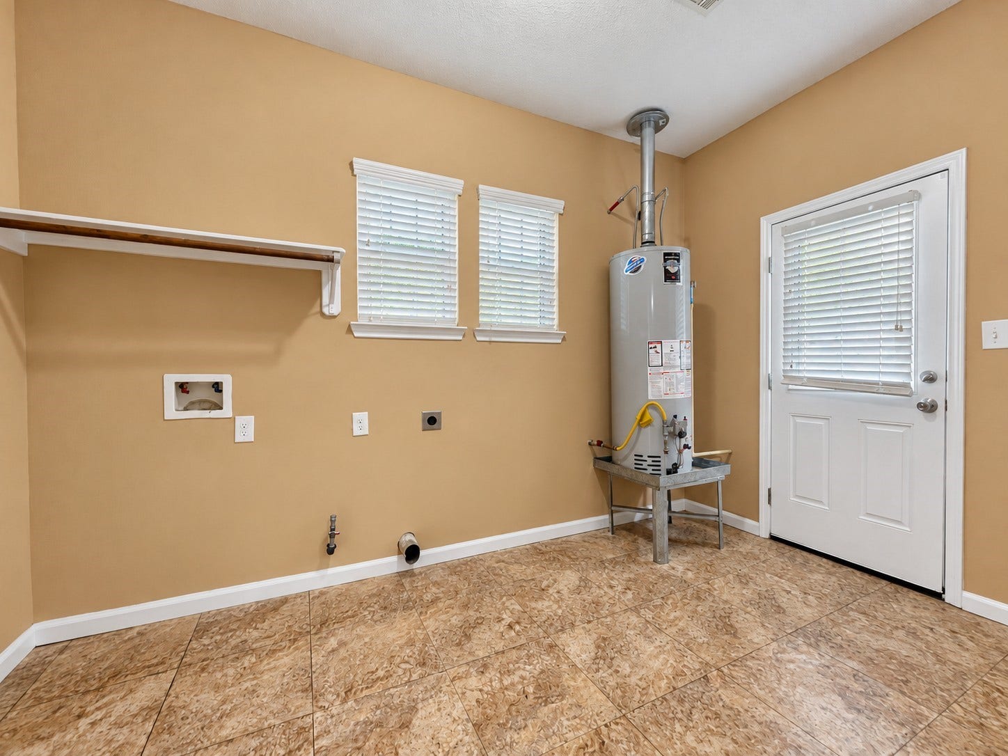 Utility Room with Access to back yard