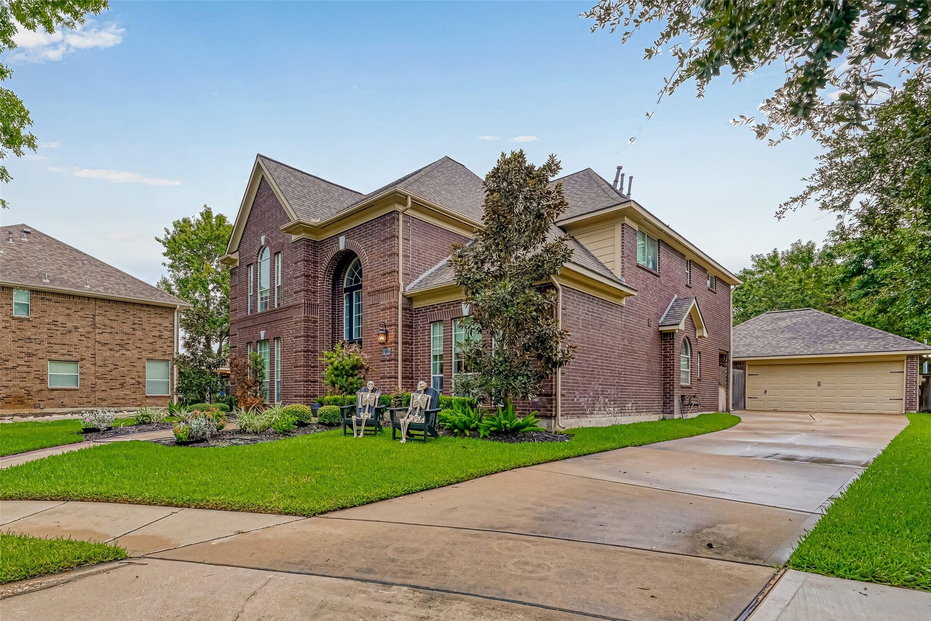 7707 Stone Arbor Drive, Sugar Land, TX 77479 More than just a 2-car garage! The long driveway leads to an oversized detached 2-car garage with garage door opener and plenty of additional off-street parking. Inside, theres room for 2 vehicles PLUS a home gymand even better, the gym equipment stays with the home! The detached design keeps the garage tucked away while allowing the homes handsome brick exterior & landscaping to take center stage.