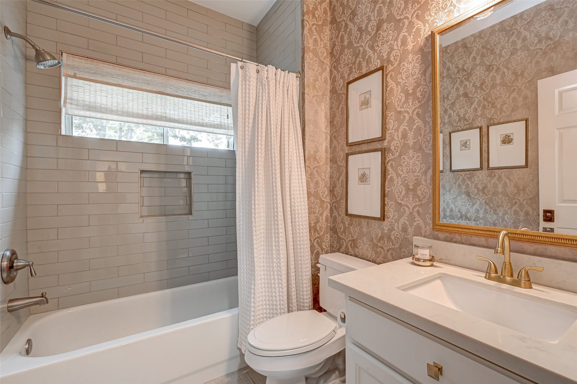 7707 Stone Arbor Drive, Sugar Land, TX 77479 Just steps from the study is this 1st-floor full bathroomone more reason that versatile room can work so well for overnight guests or perhaps a parent who prefers to avoid the stairs. The bath features a quartz-topped vanity, tub/shower combination with subway tile surround, built-in shower niche, and a window for natural light. A full double-door closet just outside the bathroom provides convenient storage, too. A thoughtful first-floor arrangement that can adapt as your needs change!