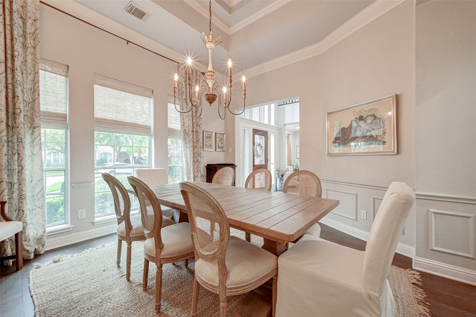 7707 Stone Arbor Drive, Sugar Land, TX 77479 Just across the foyer, the formal dining room is ready for everything from holiday dinners to Sunday brunch! Tall windows fill the room with natural light, while a beautiful chandelier, tray ceiling, crown molding, and picture-frame molding give the space an elegant, finished feel. Theres plenty of room to gather around the table and make a few memories along the way.