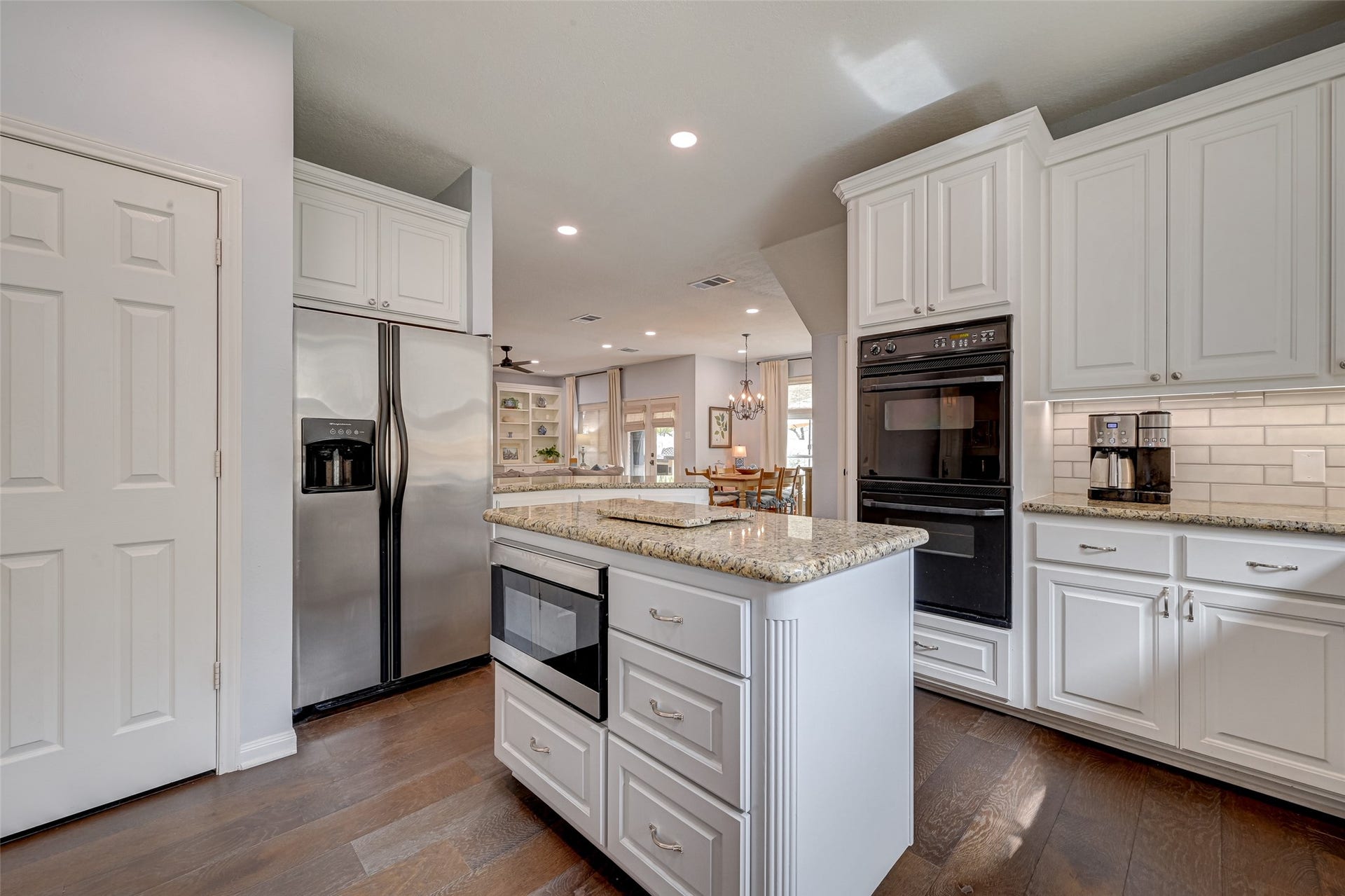 7707 Stone Arbor Drive, Sugar Land, TX 77479 Plenty of room to stock up! The kitchen includes a side-by-side refrigerator with ice & water in the door, plus terrific storage nearby. In addition to the large walk-in pantry, theres a separate closet that could easily serve as a 2nd walk-in pantry if desired. Whether you buy in bulk, have a houseful of hungry kids or simply like everything organized, this kitchen has you covered!