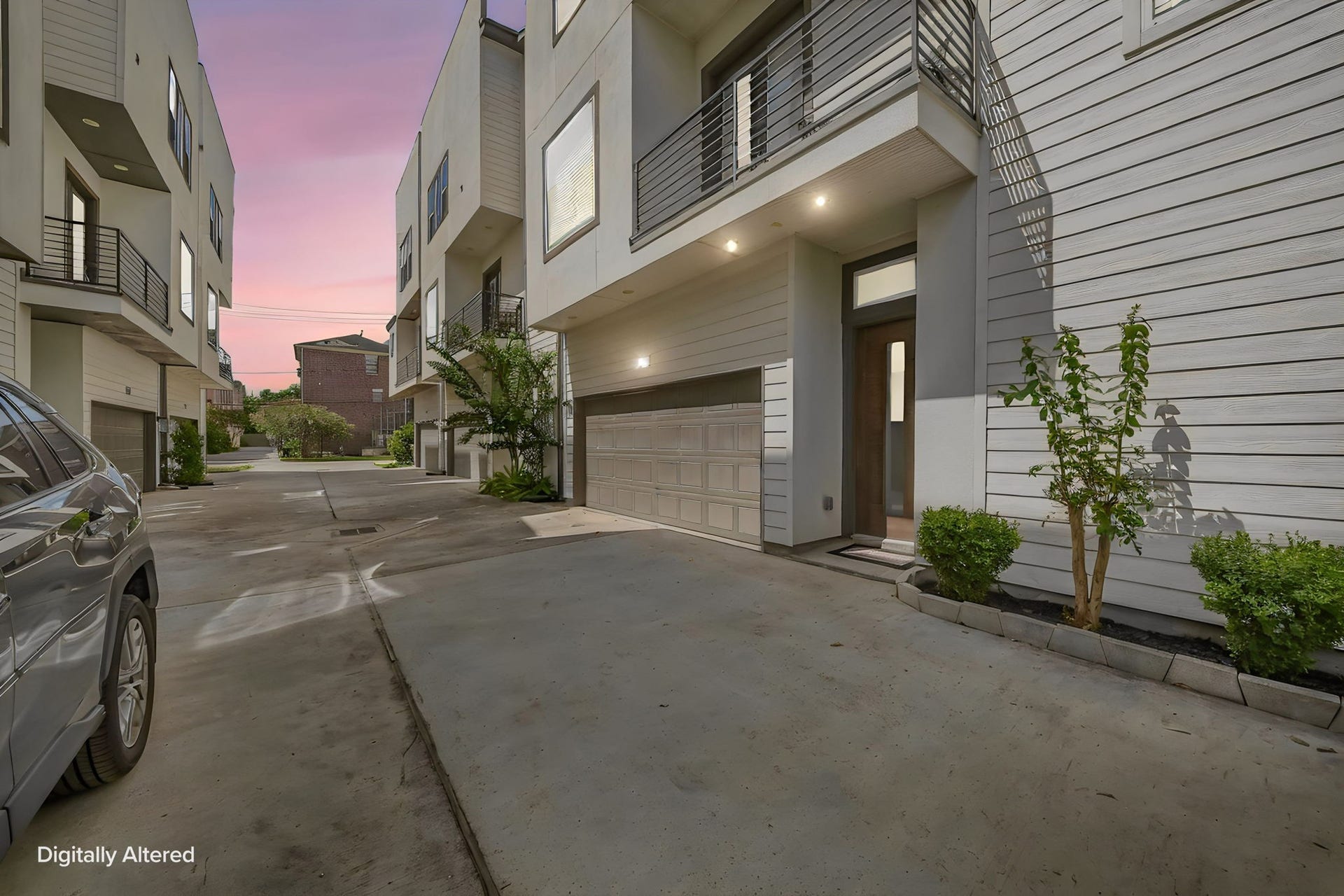 5916 Petty Street, #A, Houston, TX 77007 Welcoming exterior entry with attached two-car garage and additional off-street parking.