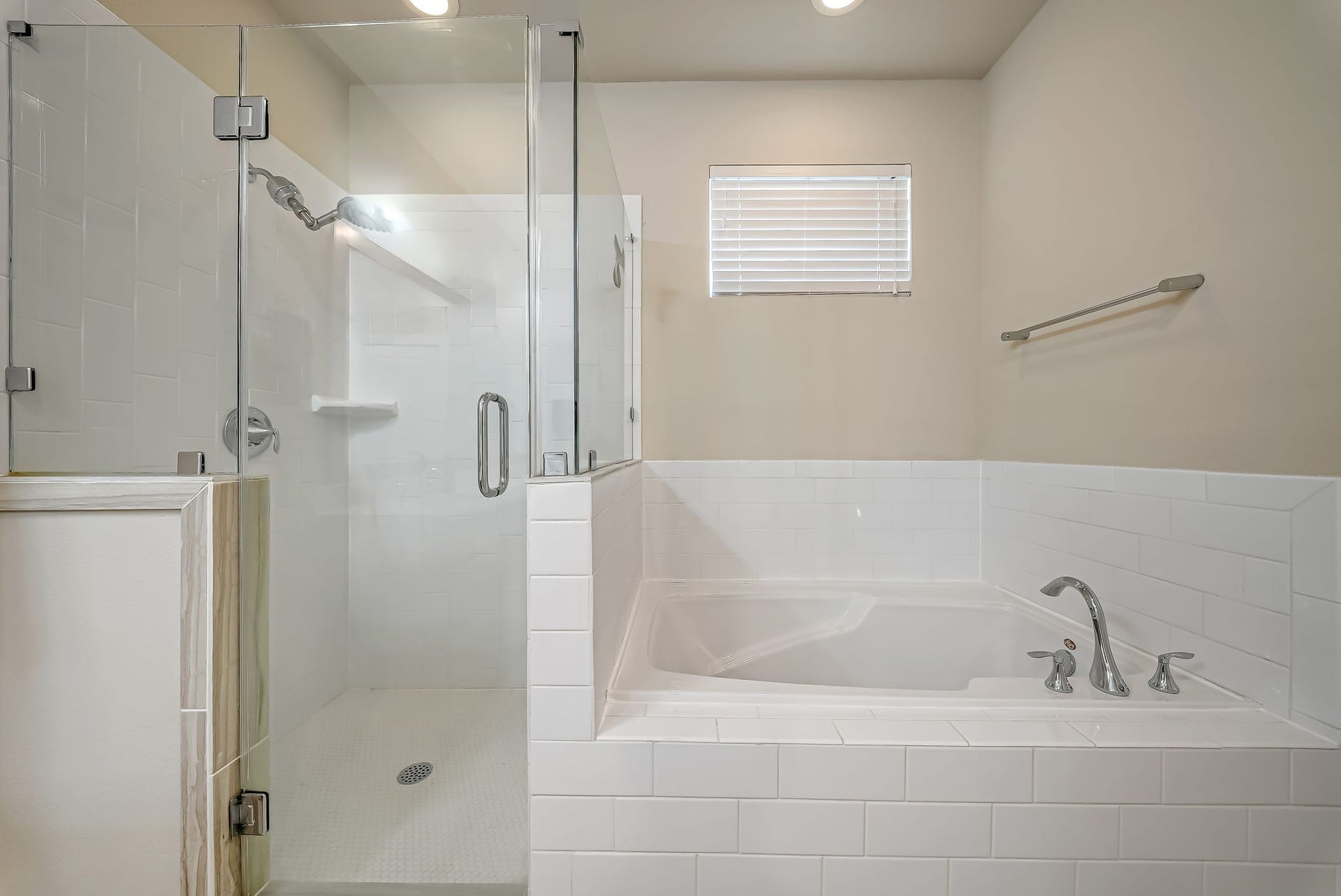 5916 Petty Street, #A, Houston, TX 77007 Luxurious primary bath with oversized walk-in shower and relaxing soaking tub.