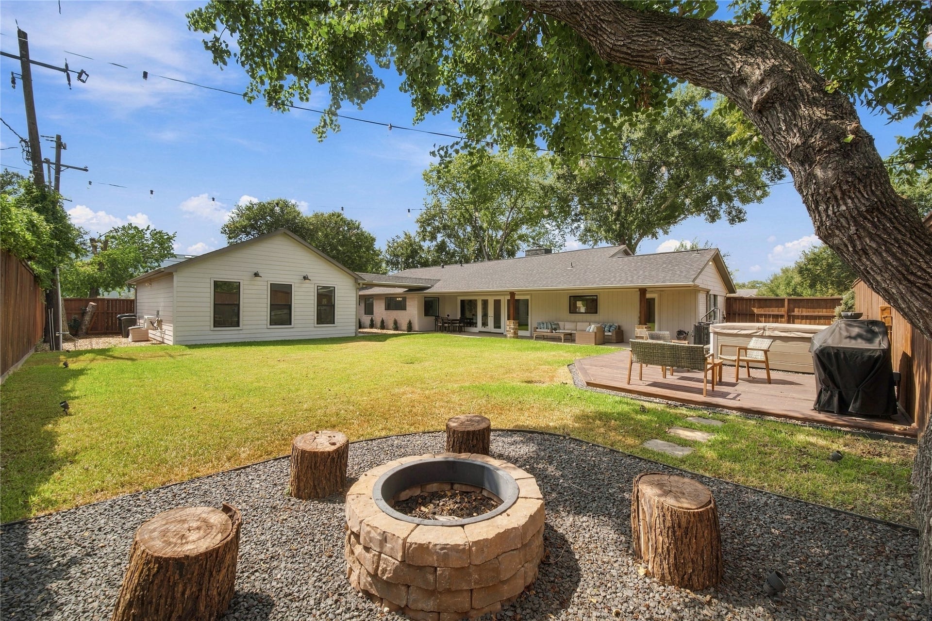 10823 Chimney Rock Road, Houston, TX 77096 Backyard with fire pit