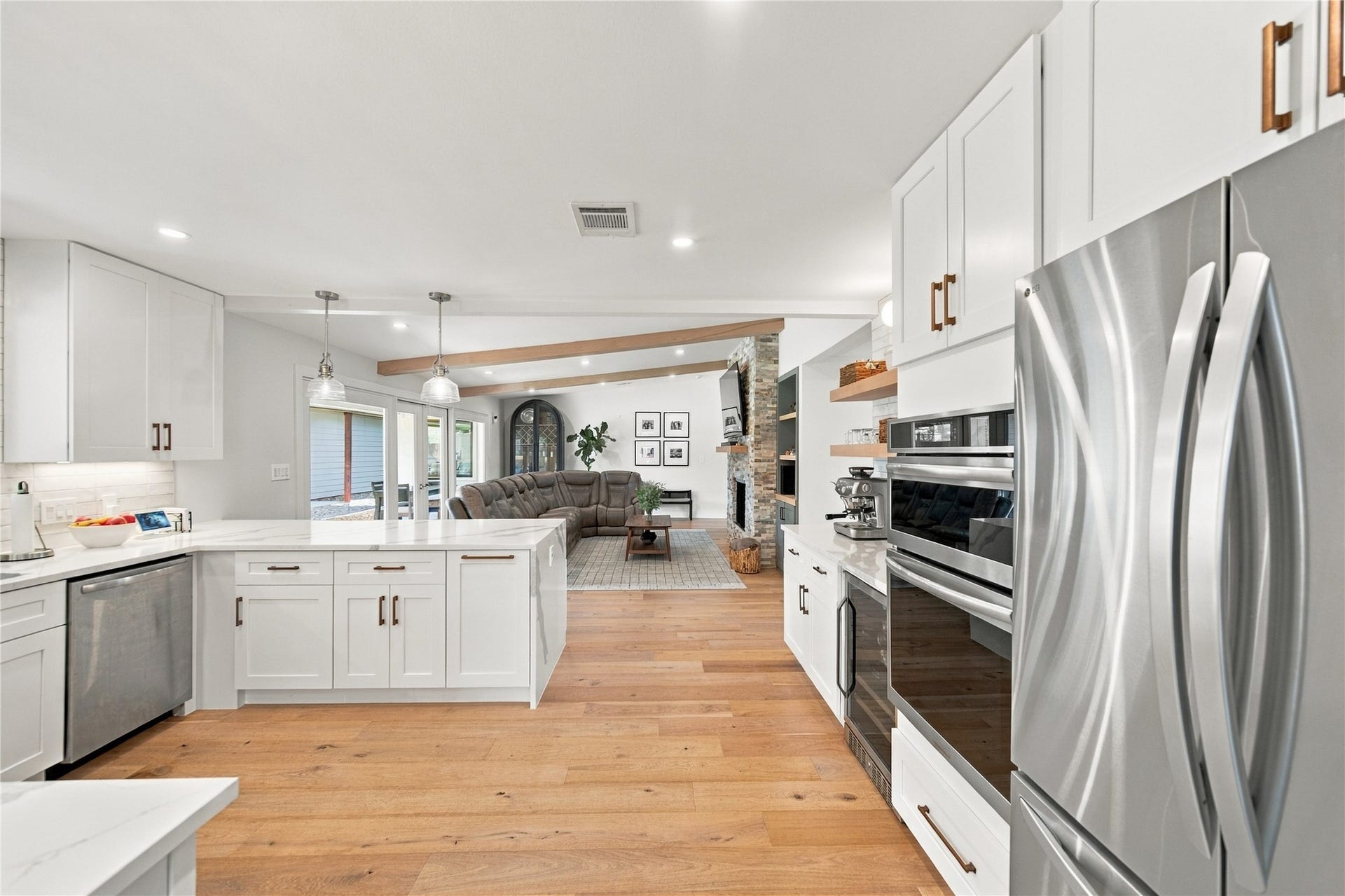 10823 Chimney Rock Road, Houston, TX 77096 Kitchen overlooking family room