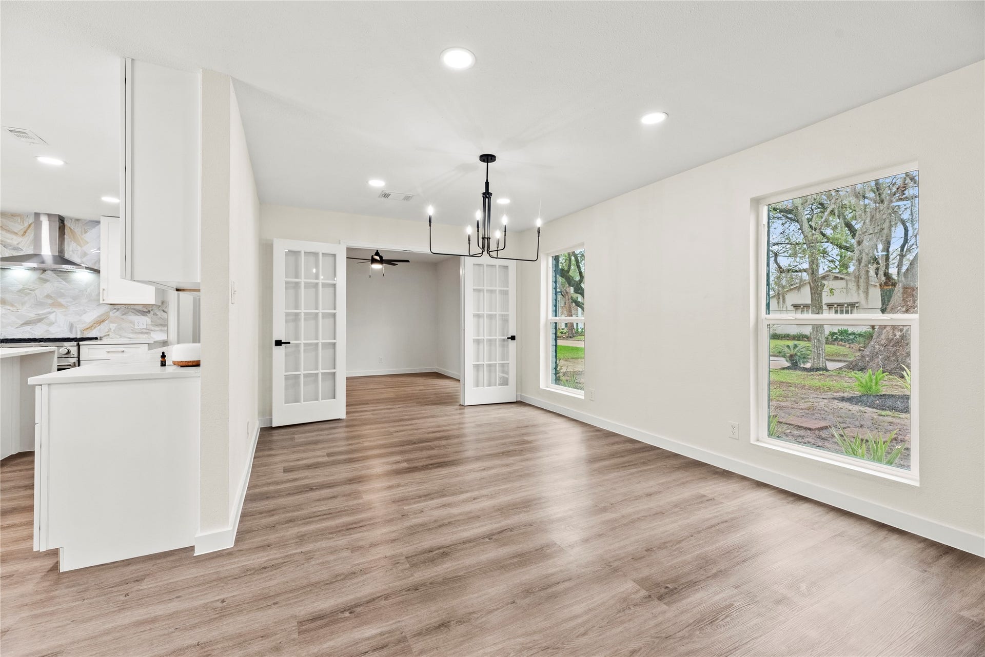 12551 Honeywood Trail, Houston, TX 77077 Dining room just off the kitchen. The home office is through the French doors.