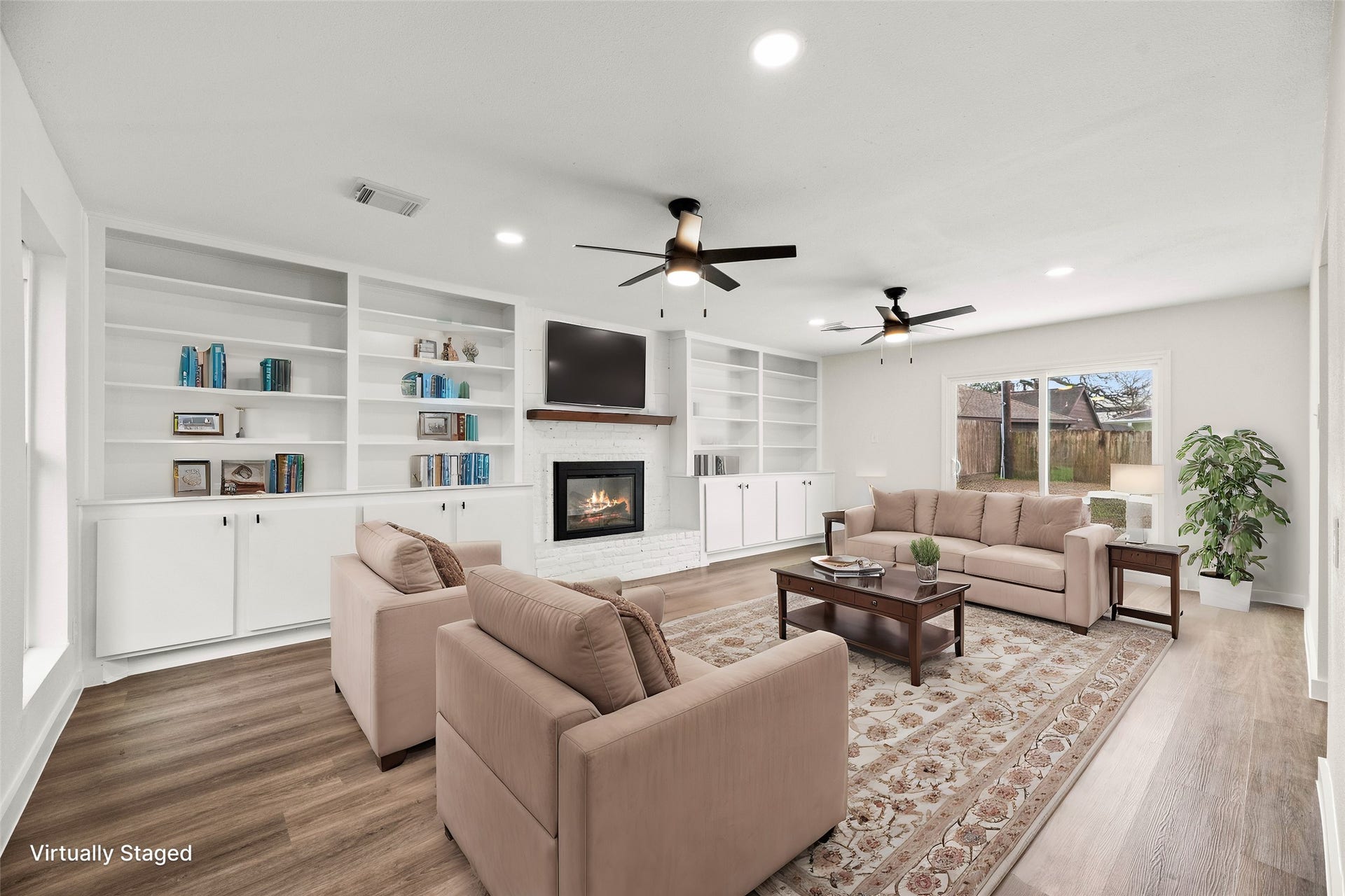 12551 Honeywood Trail, Houston, TX 77077 Virtually staged family room.