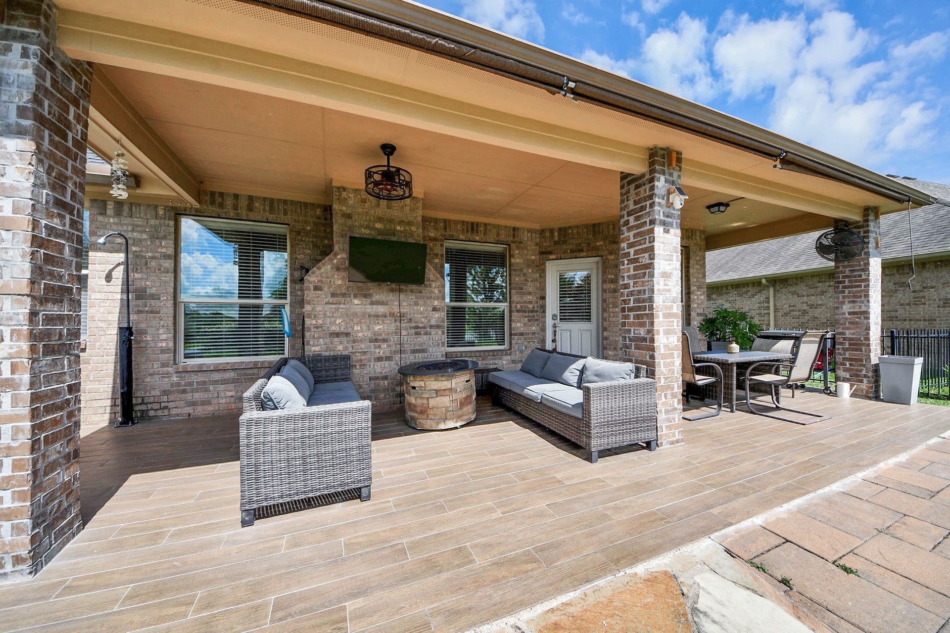 8519 E Windhaven Terrace Trail, Cypress, TX 77433 back covered patio