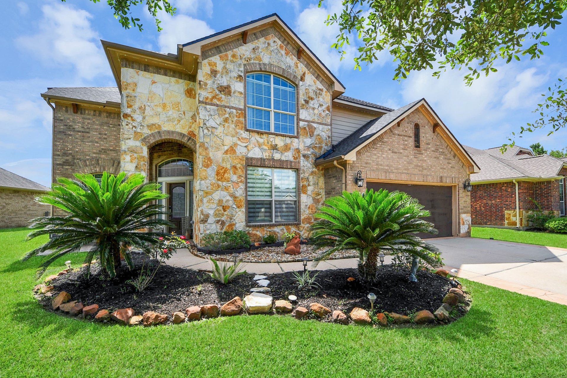 8519 E Windhaven Terrace Trail, Cypress, TX 77433 Home features permanent exterior lighting around the house, conveniently controlled through a mobile app, for Hollidays and area around ambiance ambiance