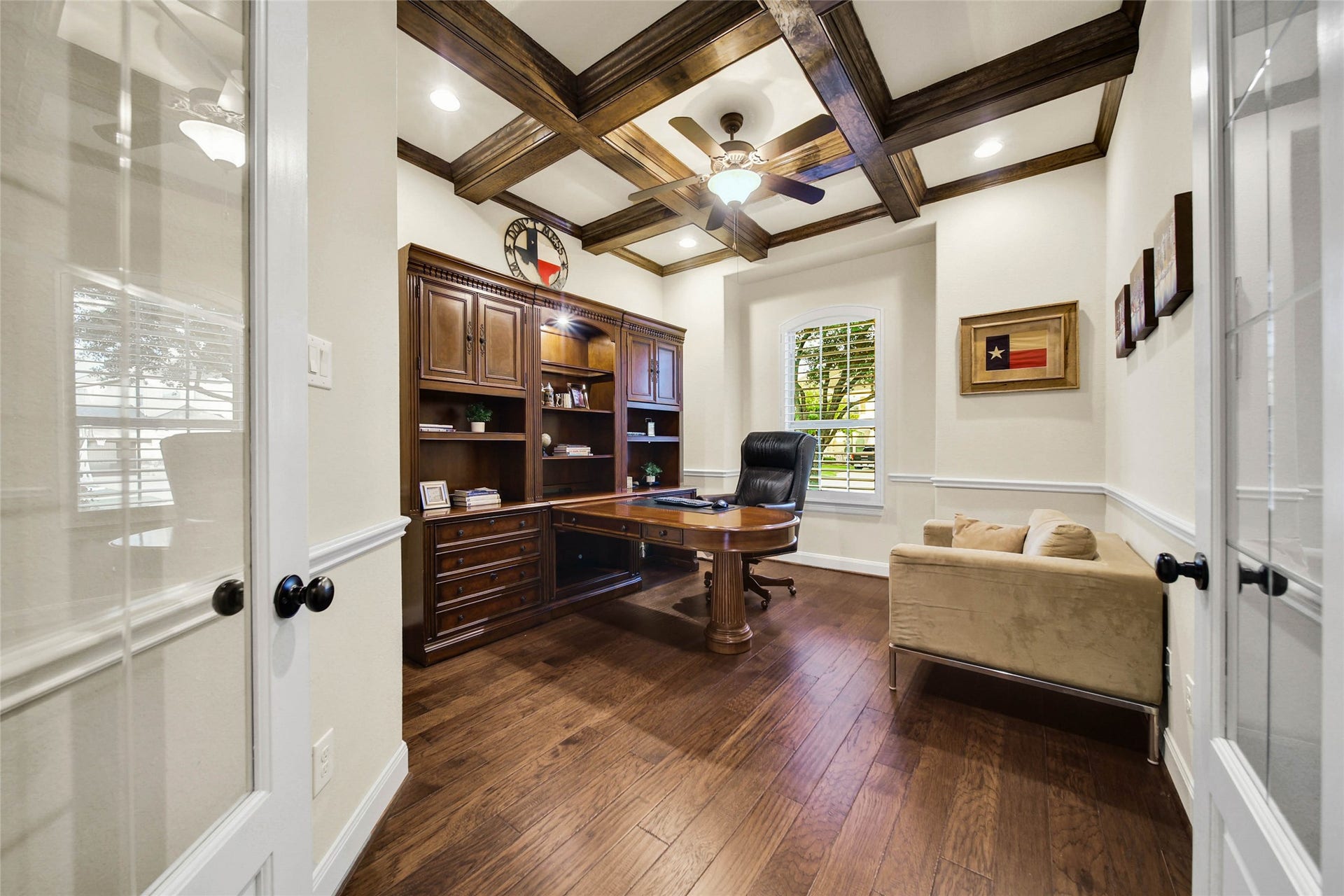 5318 Briarcliff Lane, Fulshear, TX 77441 Handsome Study with cross beamed ceiling provides the ideal space to conduct business or just keep your family organized. Glass front french doors offer privacy when needed.